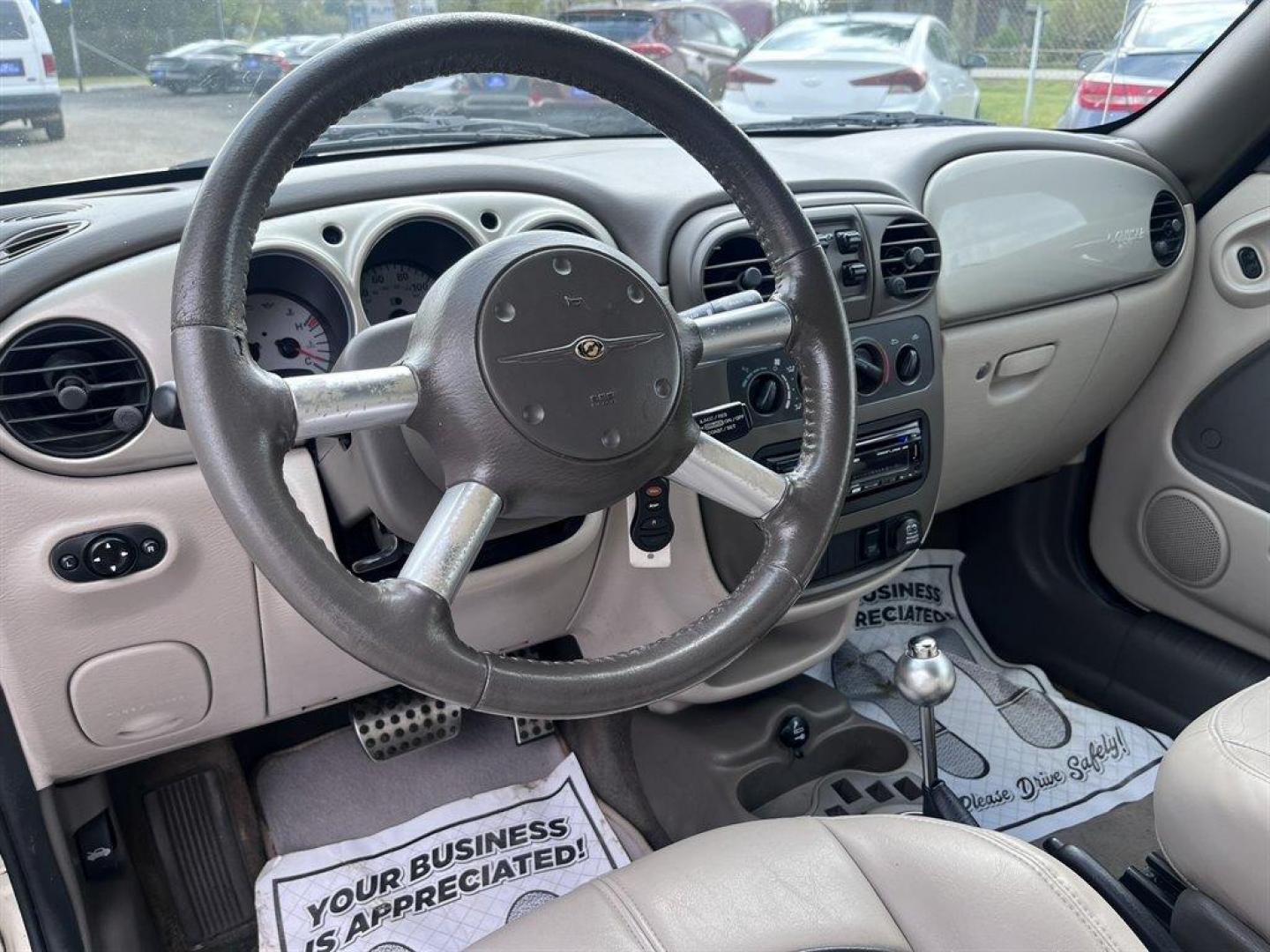 2005 White /Tan Chrysler PT Cruiser (3C3AY75S55T) with an 2.4l I-4 Dohc T/C HO 2.4l engine, Auto transmission, located at 745 East Steele Rd., West Columbia, SC, 29170, (803) 755-9148, 33.927212, -81.148483 - Special Internet Price! 2005 Chrysler PT Cruiser GT with AM/FM stereo, Cruise control, Air conditioning, Leather interior, Powered cloth convertible top, Powered windows, Powered door locks, Plus more! - Photo#4