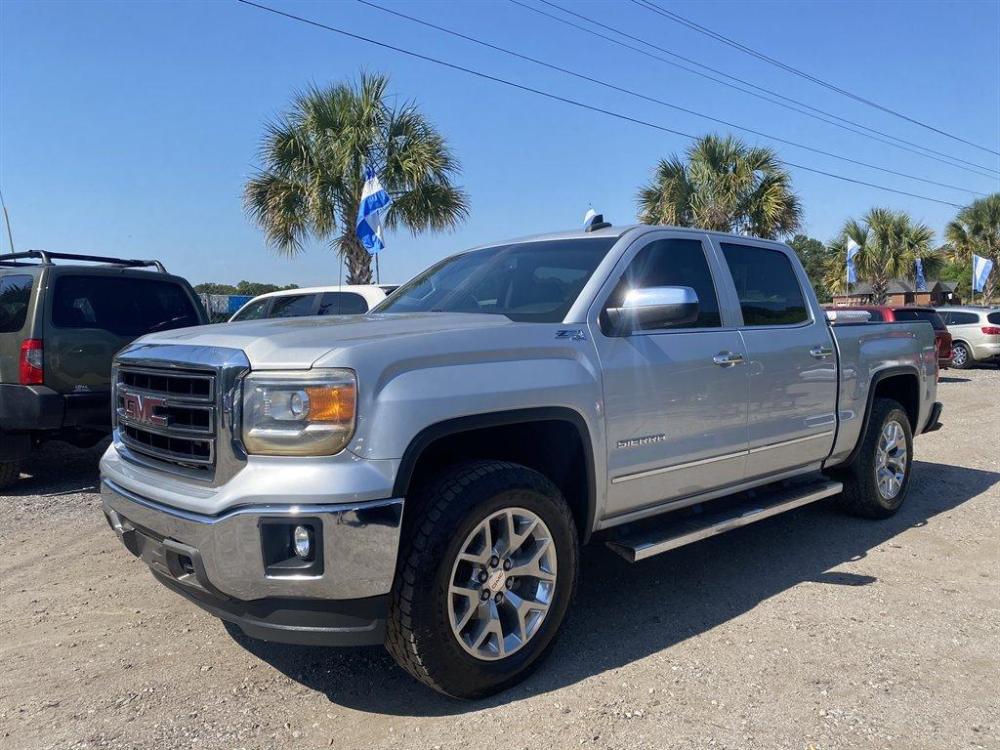 2015 Silver /Tan GMC Sierra 1500 (3GTU2VEC3FG) with an 5.3l V8 DI VVT Flex 5.3l engine, Automatic transmission, located at 745 East Steele Rd., West Columbia, SC, 29170, (803) 755-9148, 33.927212, -81.148483 - Special Internet Price! 2015 GMC Sierra with all grey leather seating, folding rear seats, backup camera, navigation, heating seats, Bose speakers, Z71 4x4, and towing! - Photo #0
