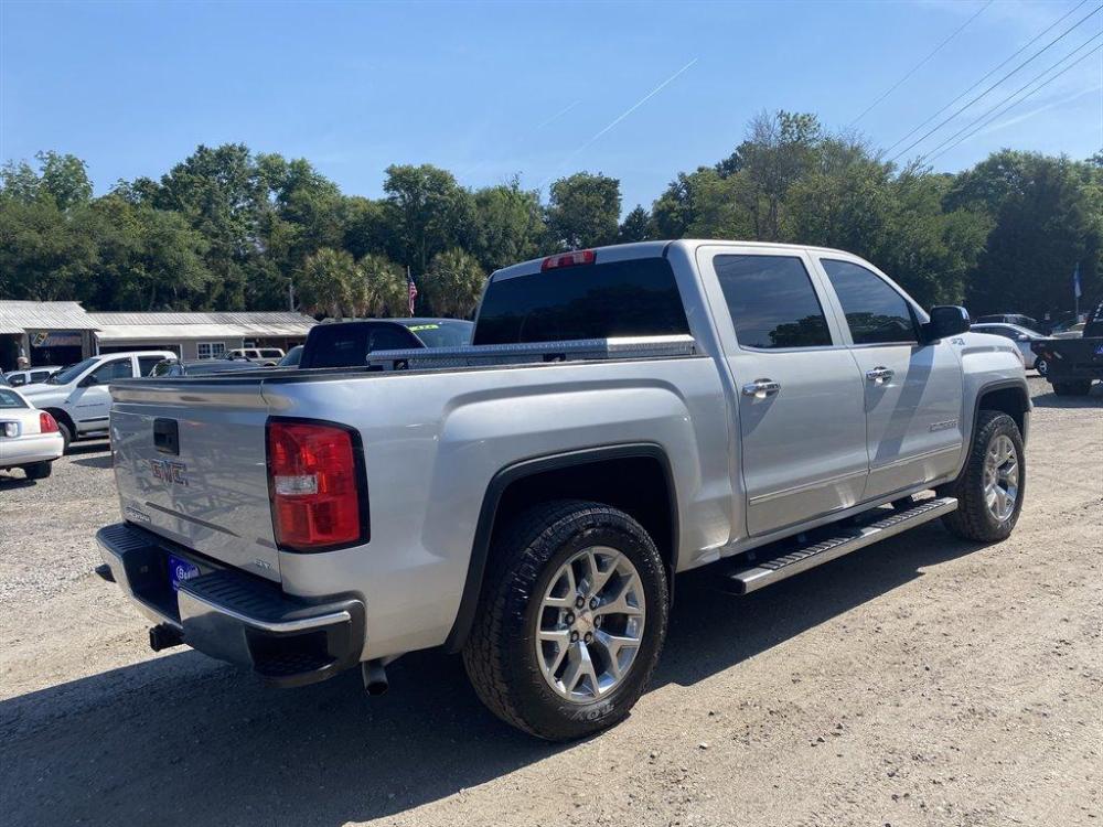 2015 Silver /Tan GMC Sierra 1500 (3GTU2VEC3FG) with an 5.3l V8 DI VVT Flex 5.3l engine, Automatic transmission, located at 745 East Steele Rd., West Columbia, SC, 29170, (803) 755-9148, 33.927212, -81.148483 - Special Internet Price! 2015 GMC Sierra with all grey leather seating, folding rear seats, backup camera, navigation, heating seats, Bose speakers, Z71 4x4, and towing! - Photo #2