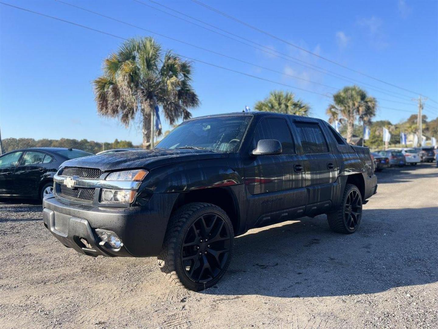 2002 Black /Black Chevrolet Avalanche (3GNEK13T22G) with an 5.3l V8 SFI 5.3l engine, Automatic transmission, located at 745 East Steele Rd., West Columbia, SC, 29170, (803) 755-9148, 33.927212, -81.148483 - 2002 Chevrolet Avalanche with AM/FM stereo, Cruise control, Auto dimming rearview mirror, Remote keyless entry, Air conditioning, Sunroof, Leather interior, Powered driver seat, Truck bed cap, Plus more! - Photo#0