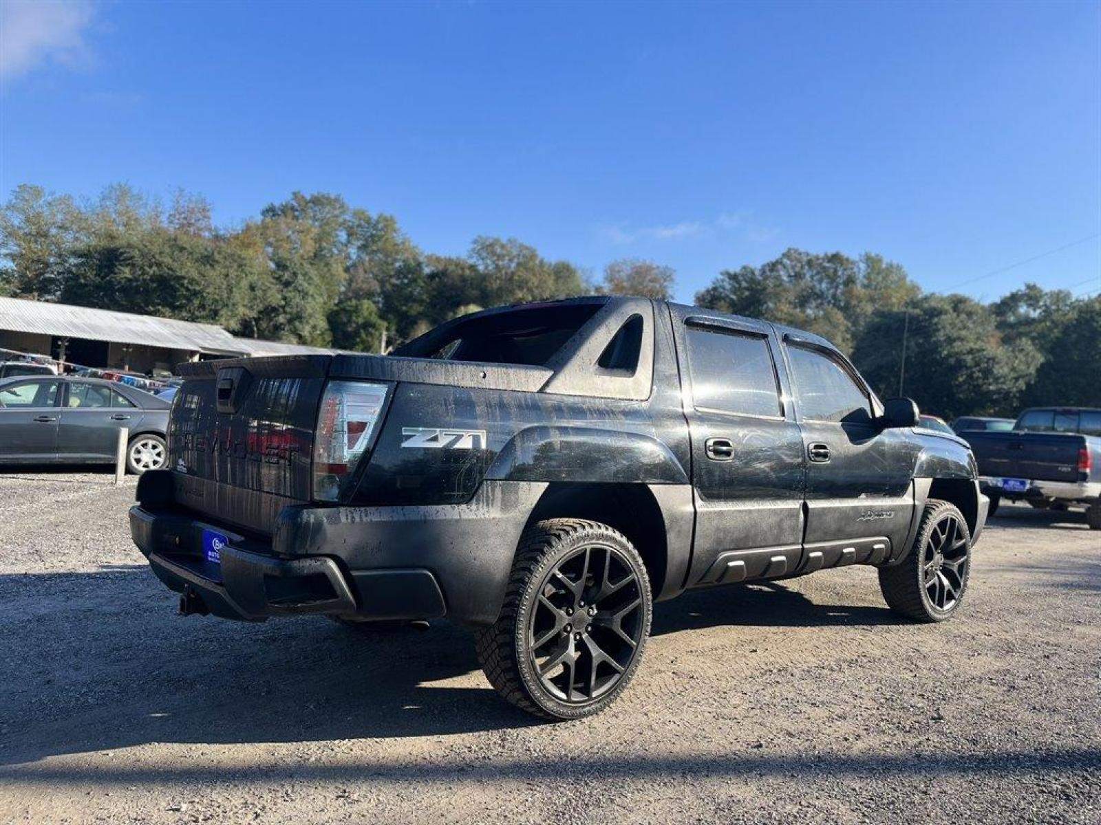 2002 Black /Black Chevrolet Avalanche (3GNEK13T22G) with an 5.3l V8 SFI 5.3l engine, Automatic transmission, located at 745 East Steele Rd., West Columbia, SC, 29170, (803) 755-9148, 33.927212, -81.148483 - Special Internet Price! 2002 Chevrolet Avalanche with AM/FM stereo, Cruise control, Auto dimming rearview mirror, Remote keyless entry, Air conditioning, Sunroof, Leather interior, Powered driver seat, Truck bed cap, Plus more! - Photo #2