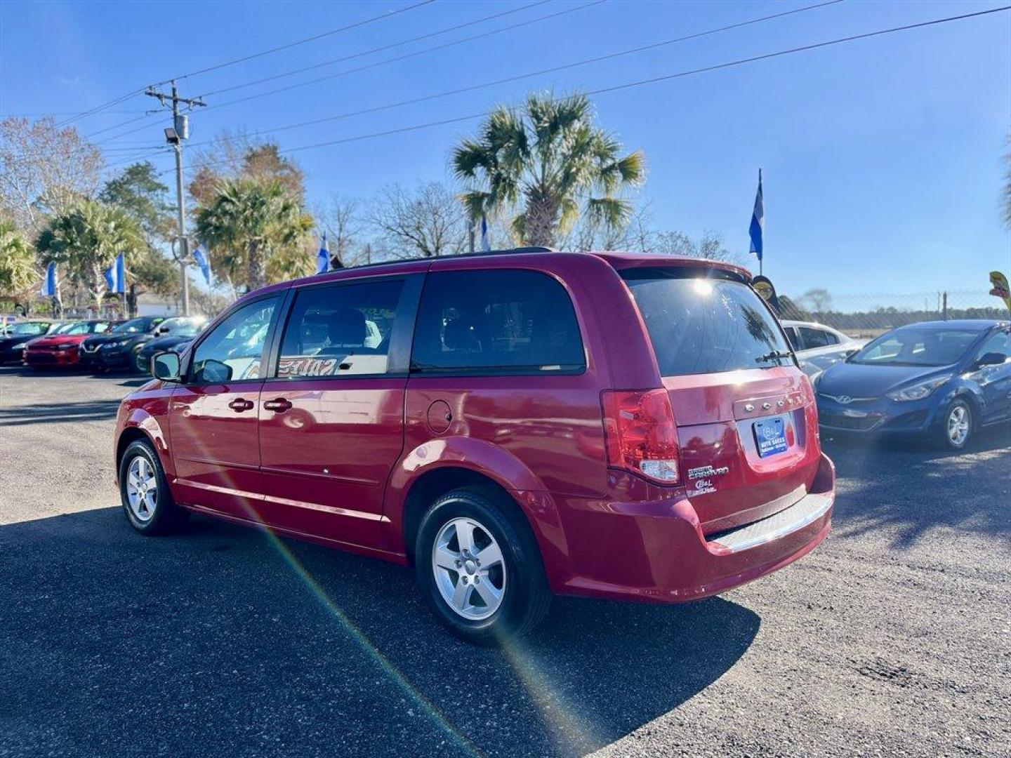 2013 Red /Black Dodge Grand Caravan (2C4RDGCG4DR) with an 3.6l V6 MPI Dohc VVT Flex engine, Automatic transmission, located at 745 East Steele Rd., West Columbia, SC, 29170, (803) 755-9148, 33.927212, -81.148483 - Special Internet Price! 2013 Dodge Grand Caravan - Photo#2