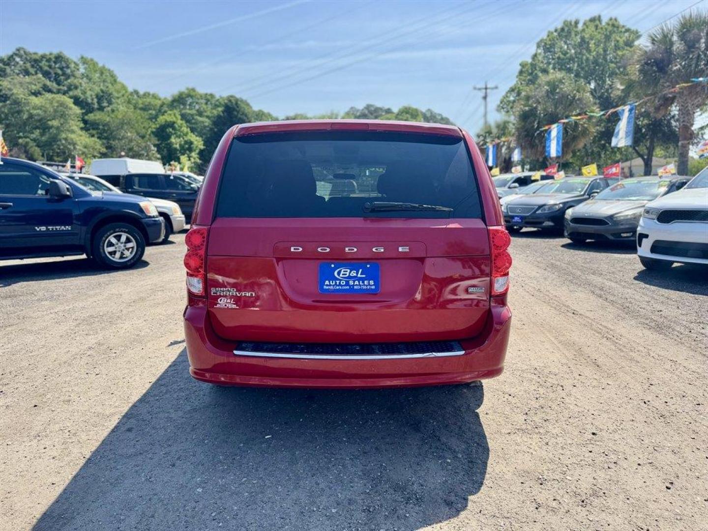 2013 Red /Black Dodge Grand Caravan (2C4RDGCG4DR) with an 3.6l V6 MPI Dohc VVT Flex engine, Automatic transmission, located at 745 East Steele Rd., West Columbia, SC, 29170, (803) 755-9148, 33.927212, -81.148483 - Photo#3