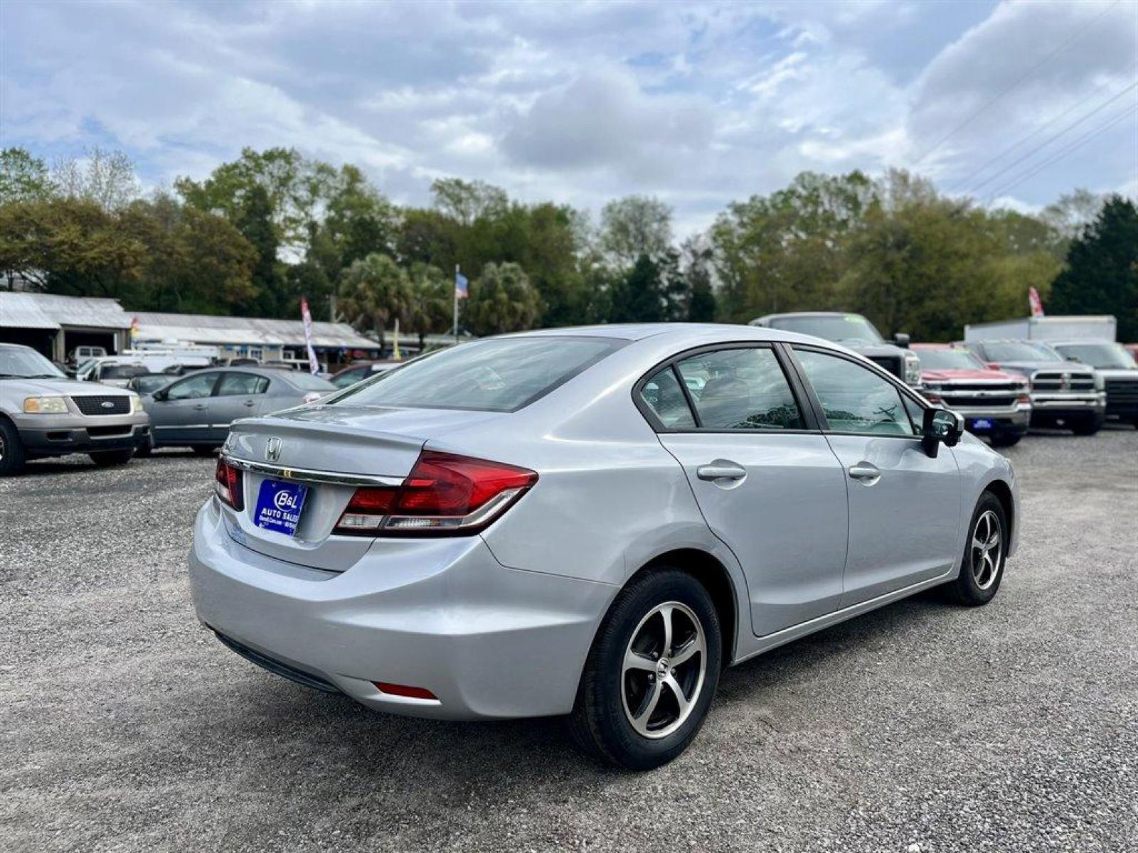 2015 Silver /Black Honda Civic (2HGFB2F72FH) with an 1.8l I-4 MPI Sohc 1.8l engine, Automatic transmission, located at 745 East Steele Rd., West Columbia, SC, 29170, (803) 755-9148, 33.927212, -81.148483 - Special Internet Price! 2015 Honda Civic with Bluetooth, AM/FM/CD Audio System, 7 display, Cruise Control with Steering Wheel Controls, Automatic Air Conditioning, Remote Keyless Entry, Powered windows, Plus more! - Photo #2
