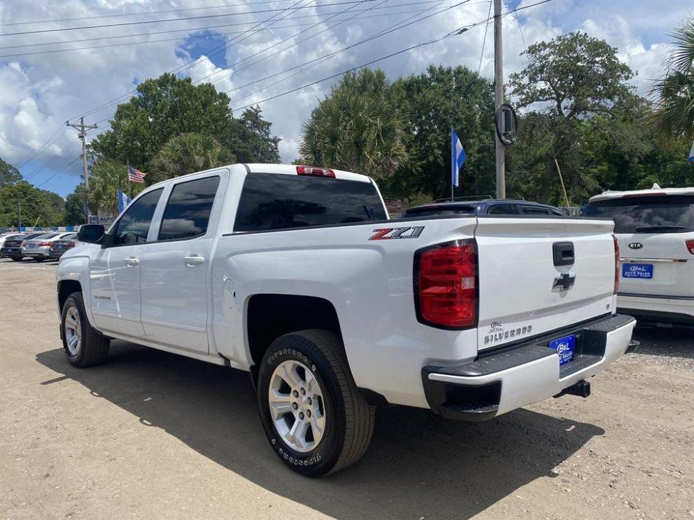 2018 White /Black Chevrolet Silverado 1500 (3GCUKREC9JG) with an 5.3l V8 DI VVT Flex 5.3l engine, Automatic transmission, located at 745 East Steele Rd., West Columbia, SC, 29170, (803) 755-9148, 33.927212, -81.148483 - Special Internet Price! 2018 Chevrolet Silverado with all black leather, backup camera, navigation, bluetooth, powered driver seat, cruise control, cold a/c! - Photo #1
