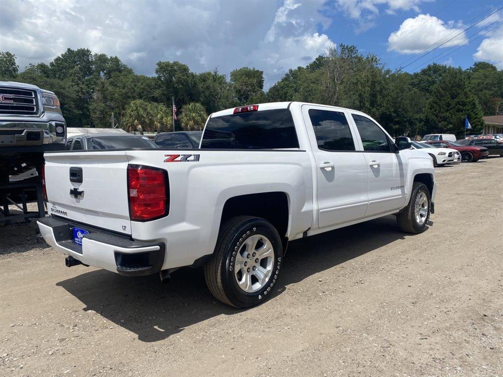 2018 White /Black Chevrolet Silverado 1500 (3GCUKREC9JG) with an 5.3l V8 DI VVT Flex 5.3l engine, Automatic transmission, located at 745 East Steele Rd., West Columbia, SC, 29170, (803) 755-9148, 33.927212, -81.148483 - Special Internet Price! 2018 Chevrolet Silverado with all black leather, backup camera, navigation, bluetooth, powered driver seat, cruise control, cold a/c! - Photo #3