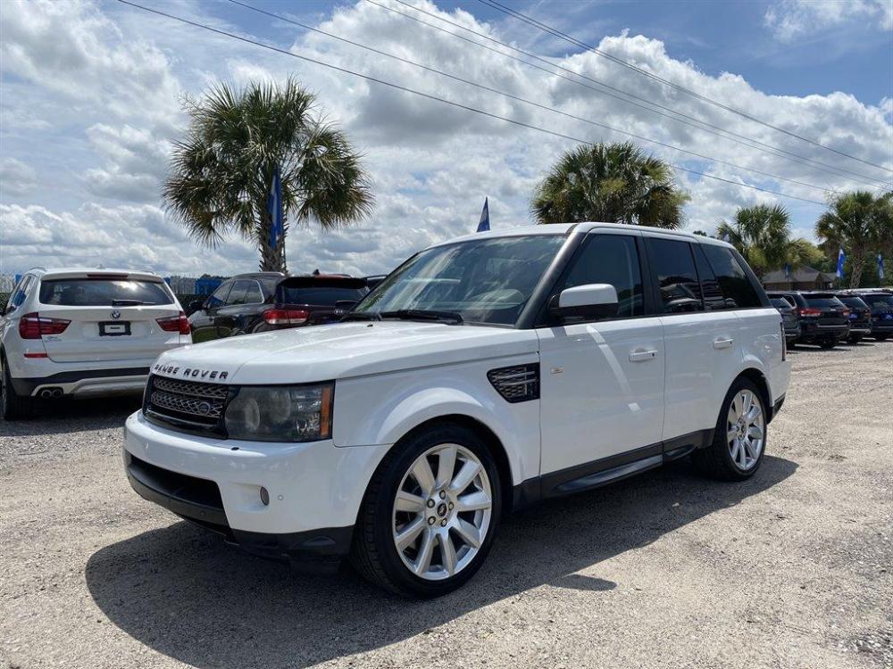 2013 White /Tan Land Rover Range Rover Sport (SALSK2D41DA) with an 5.0l V8 SFI 5.0l engine, Automatic transmission, located at 745 East Steele Rd., West Columbia, SC, 29170, (803) 755-9148, 33.927212, -81.148483 - Special Internet Price! 2013 Land Rover Range Rover Sport with all tan leather seating, powered front seats, heat seats for front and rear, sunroof, navigation, bluetooth, powered liftgate, cold a/c! - Photo #0