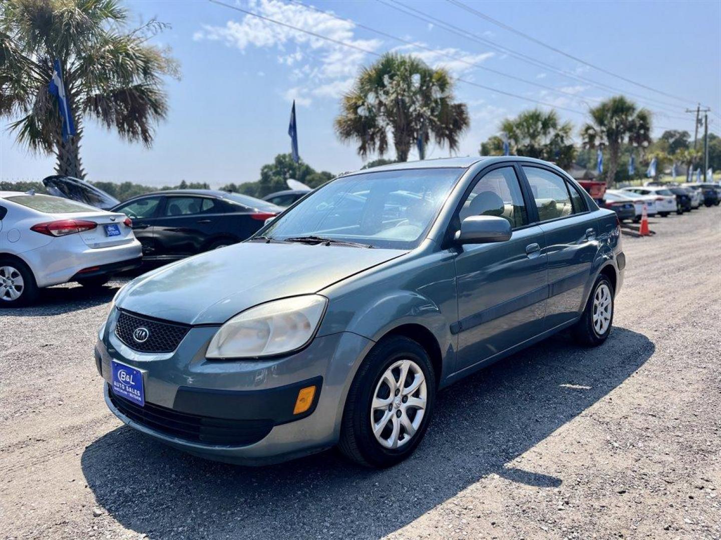 2006 Green /Tan Kia Rio (KNADE123166) with an 1.6l I-4 MPI Dohc 1.6l engine, Automatic transmission, located at 745 East Steele Rd., West Columbia, SC, 29170, (803) 755-9148, 33.927212, -81.148483 - Special Internet Price! 2006 Kia Rio with AM/FM stereo w/CD player, Air conditioning, Front bucket seats, Full cloth seats, 60/40 split-folding rear seats, Luggage hook on front passenger headrest, Plus more! - Photo#0