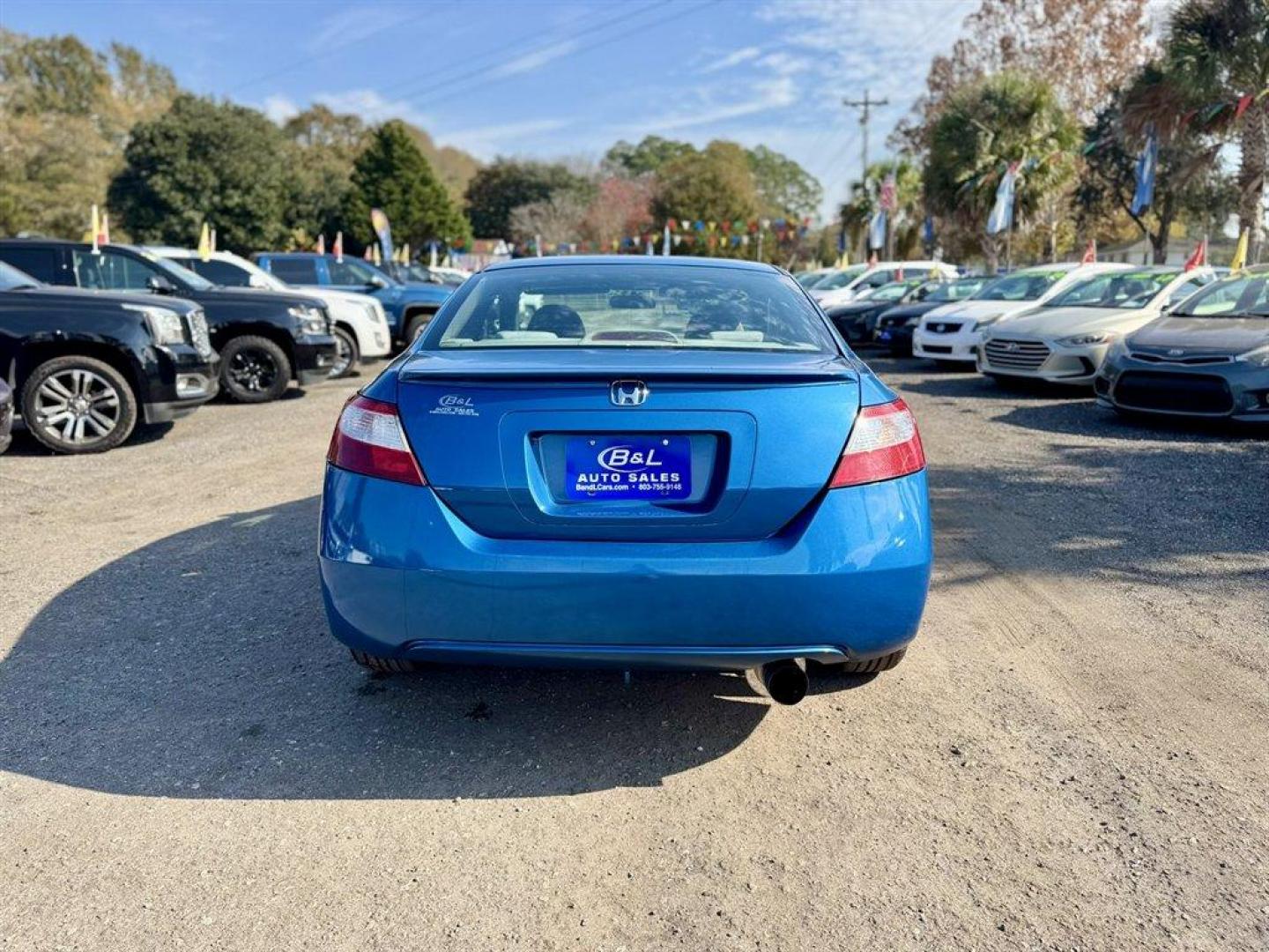 2006 Blue /Grey Honda Civic (2HGFG12836H) with an 1.8l I-4 MPI Sohc 1.8l engine, Automatic transmission, located at 745 East Steele Rd., West Columbia, SC, 29170, (803) 755-9148, 33.927212, -81.148483 - Photo#4