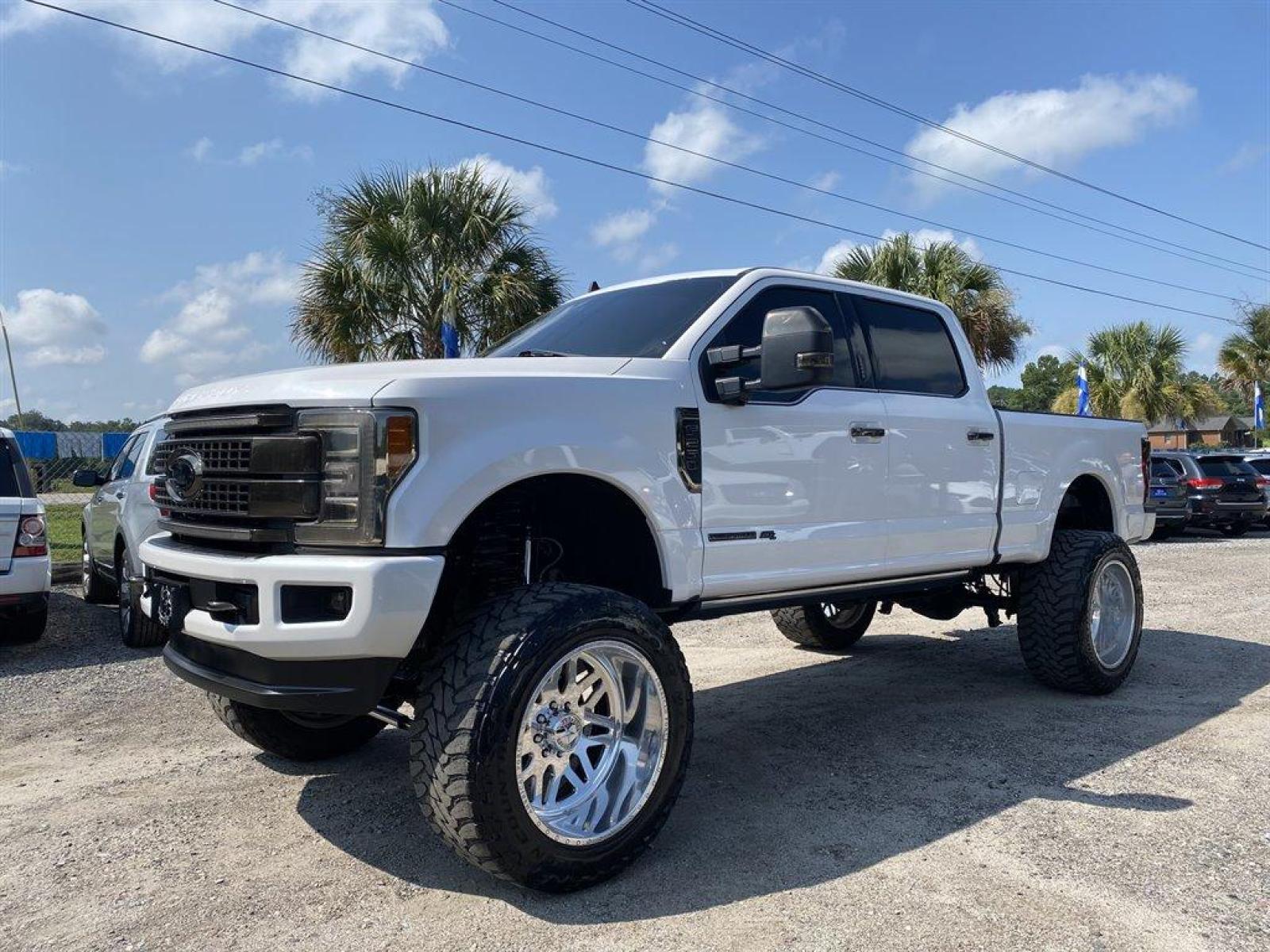 2019 White /Black Ford F250sd (1FT7W2BT1KE) with an 6.7l V8 DI OHC Tdsl 6.7l engine, Automatic transmission, located at 745 East Steele Rd., West Columbia, SC, 29170, (803) 755-9148, 33.927212, -81.148483 - PRICE REDUCED!!!!!!Special Internet Price! 2019 Ford F250SD 12 full throttle suspension lift, chrome piggy back shocks, dual chrome stabilizers, american force 24 inch wheels 40 toyo tires, JL Audio stealth box, slim lime retractable bed cover and bed liner, bluetooth, cruise control, towing package - Photo #0