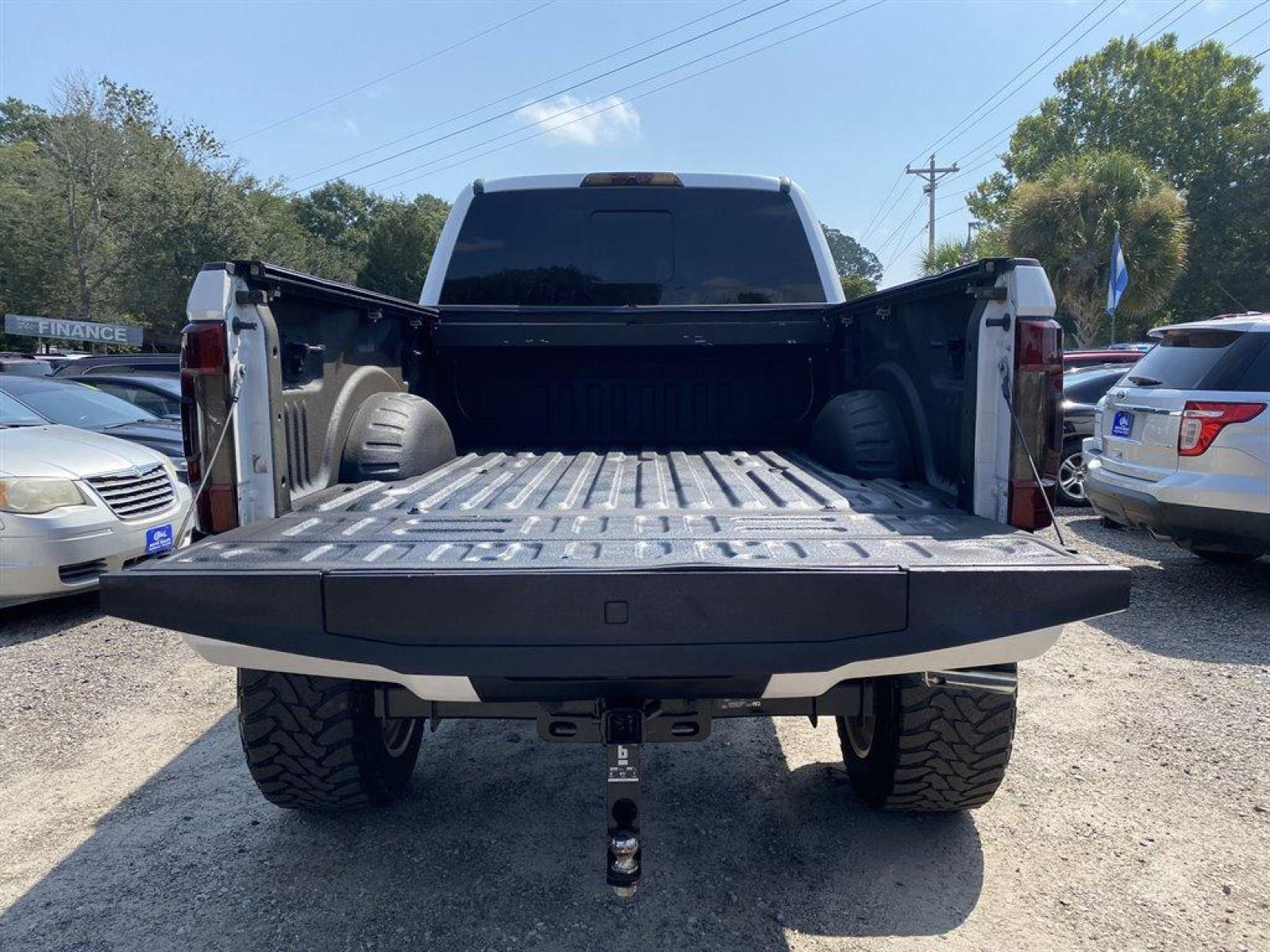 2019 White /Black Ford F250sd (1FT7W2BT1KE) with an 6.7l V8 DI OHC Tdsl 6.7l engine, Automatic transmission, located at 745 East Steele Rd., West Columbia, SC, 29170, (803) 755-9148, 33.927212, -81.148483 - PRICE REDUCED!!!!!!Special Internet Price! 2019 Ford F250SD 12 full throttle suspension lift, chrome piggy back shocks, dual chrome stabilizers, american force 24 inch wheels 40 toyo tires, JL Audio stealth box, slim lime retractable bed cover and bed liner, bluetooth, cruise control, towing package - Photo #39