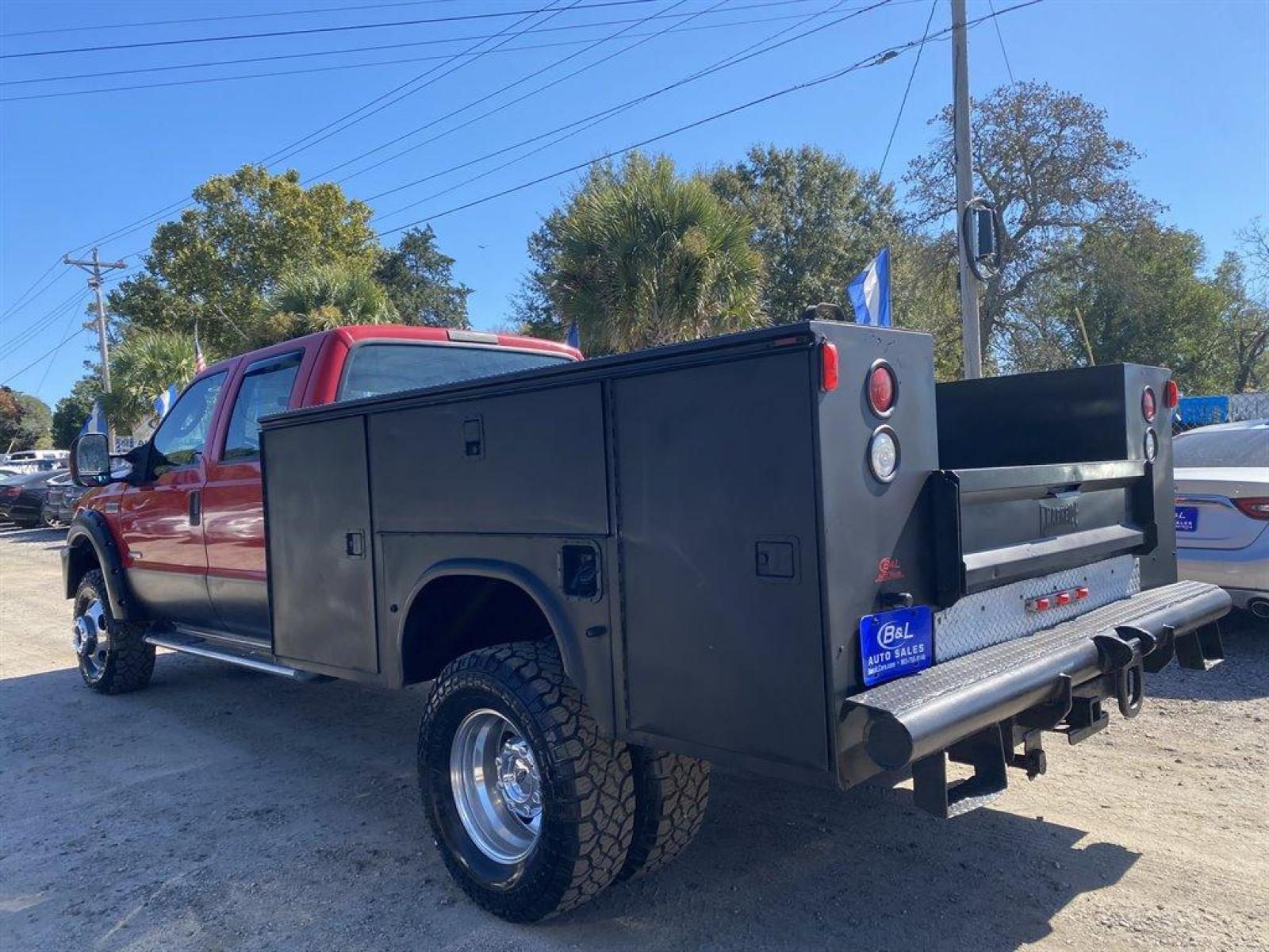 2006 Red /Grey Ford F350sd Lariat Crew Cab 4WD DRW (1FDWW37P16E) with an 6.0l V8 FI Tdsl 6.0l engine, Automatic transmission, located at 745 East Steele Rd., West Columbia, SC, 29170, (803) 755-9148, 33.927212, -81.148483 - Special Internet Price! - Photo #1