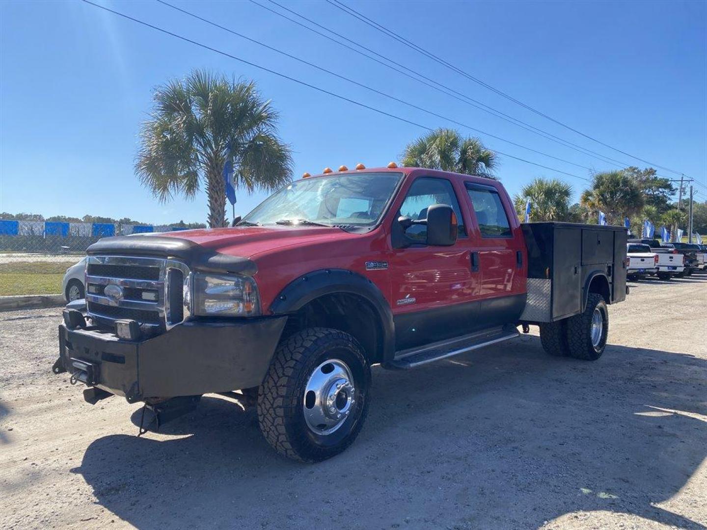 2006 Red /Grey Ford F350sd Lariat Crew Cab 4WD DRW (1FDWW37P16E) with an 6.0l V8 FI Tdsl 6.0l engine, Automatic transmission, located at 745 East Steele Rd., West Columbia, SC, 29170, (803) 755-9148, 33.927212, -81.148483 - Special Internet Price! - Photo#0