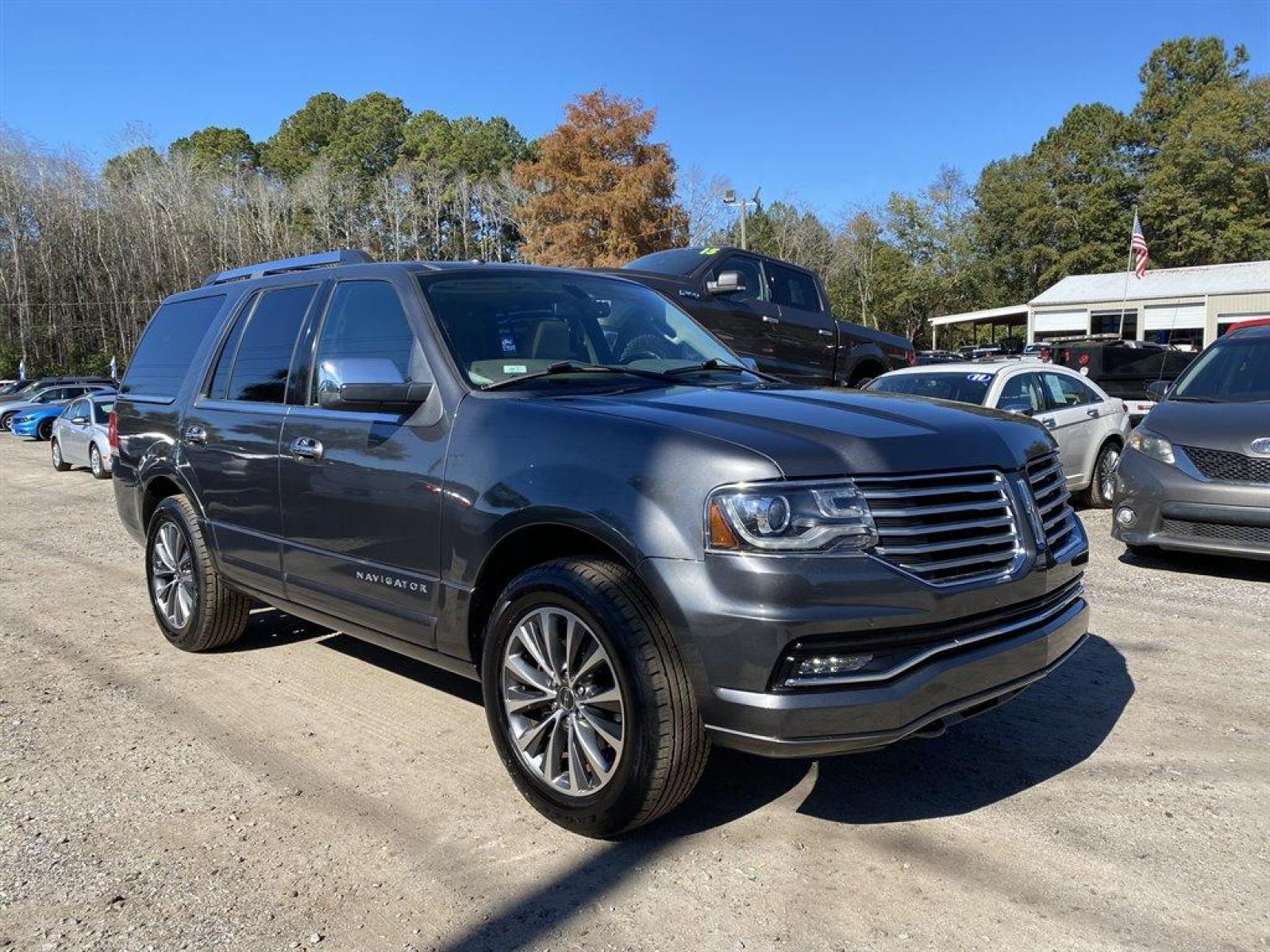 2015 Grey /Grey Lincoln Navigator (5LMJJ2HT2FE) with an 3.5l V6 DI T/C Ecoboost 3 engine, Automatic transmission, located at 745 East Steele Rd., West Columbia, SC, 29170, (803) 755-9148, 33.927212, -81.148483 - Special Internet Price! 2015 Lincoln Navigator with bluetooth, backup camera, sunroof, leather seats, navigation, push to start, 3rd row seating, 3rd row powered folding, powered liftgate, powered running board, powered front seats, heating and cooling front seats, cold a/c and hot heat! - Photo #3