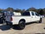 2005 White /Black Ford F350sd (1FTWW31P45E) with an 6.0l V8 FI Tdsl 6.0l engine, Automatic transmission, located at 745 East Steele Rd., West Columbia, SC, 29170, (803) 755-9148, 33.927212, -81.148483 - Special Internet Price! 2005 Ford F350 with all black leather seats, powered locks, lumbar support in driver seat, rear folding bench seat, cold a/c and hot heat! - Photo #2