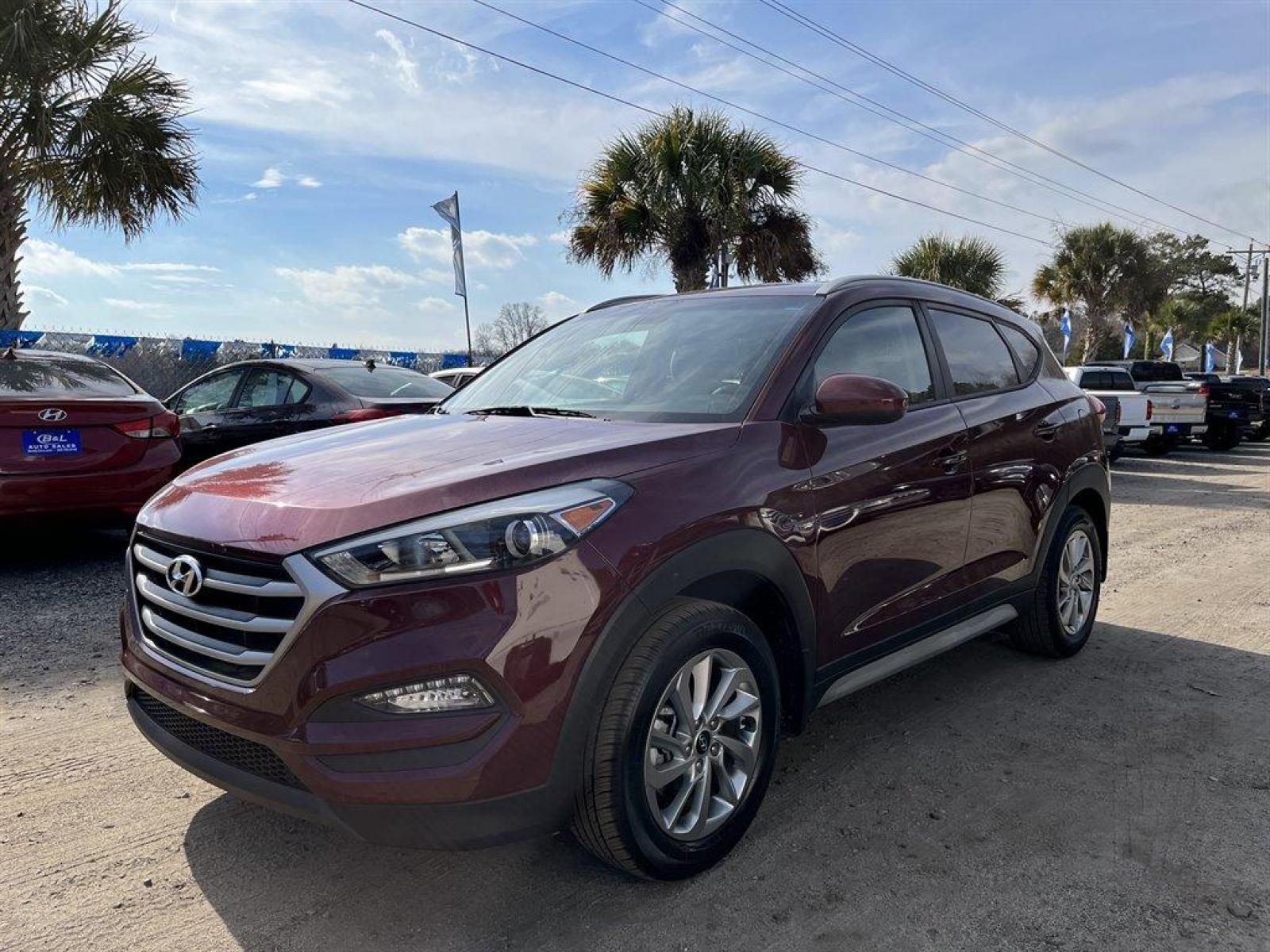 2018 Burgandy /Cream Hyundai Tucson SE AWD (KM8J3CA42JU) with an 2.0l I-4 DI Dohc Cvvt 2.0 engine, Automatic transmission, located at 745 East Steele Rd., West Columbia, SC, 29170, (803) 755-9148, 33.927212, -81.148483 - Special Internet Price-2018 Hyundai Tucson Has Trial Subscription to SiriusXM, Back Up Camera, Power Front Seats, Bluetooth, 8 LCD Color Touchscreen, Cruise Control, Blind Spot Detection (BSD) with Lane Change Assist (LCA) Blind Spot, Plus More! - Photo #1
