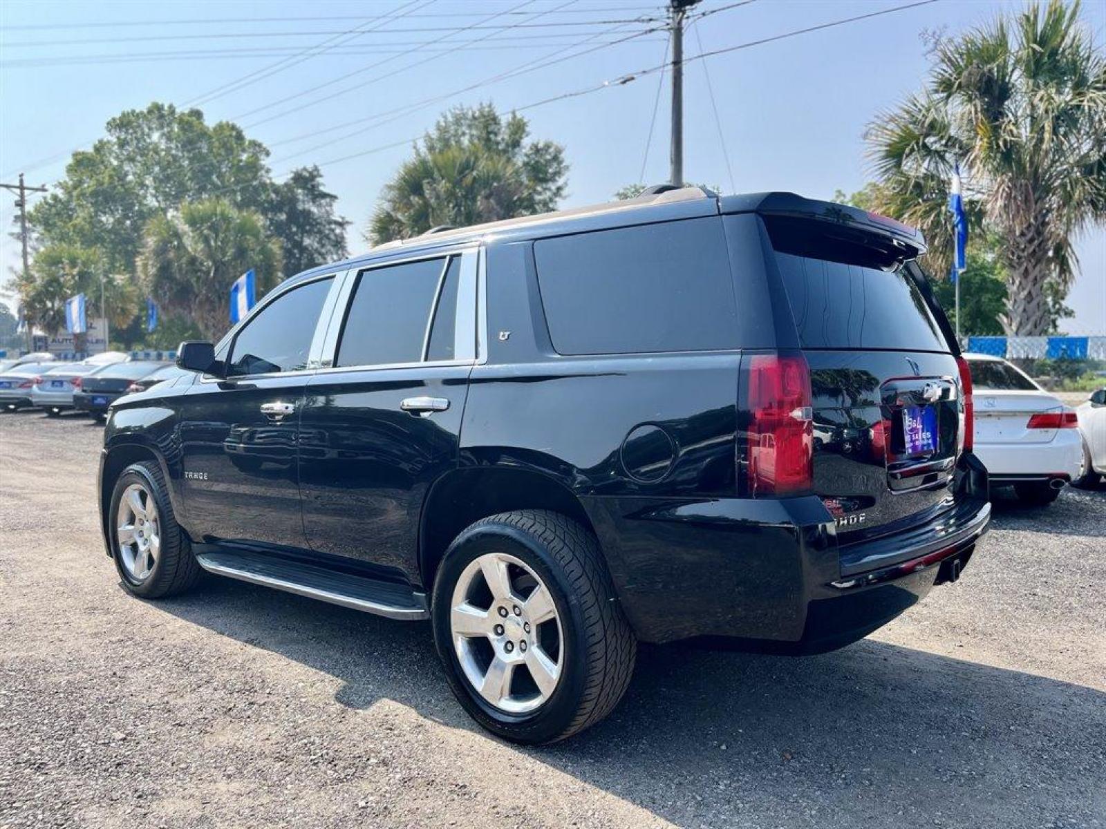 2015 Black /Black Chevrolet Tahoe LT 4WD (1GNSKBKC5FR) with an 5.3l V8 DI VVT Flex 5.3l engine, Automatic transmission, located at 745 East Steele Rd., West Columbia, SC, 29170, (803) 755-9148, 33.927212, -81.148483 - Special Internet Price-2015 Chevrolet Tahoe LT has Leather Interior, Heated Seats, 3rd Row Seating, Back Up Camera, Navigation, Lane Departure Warning and Safety Alert Seat, Forward Collision Alert sensor indicator, Audio system feature, Bose premium 9-speaker system with subwoofer in center console - Photo #2