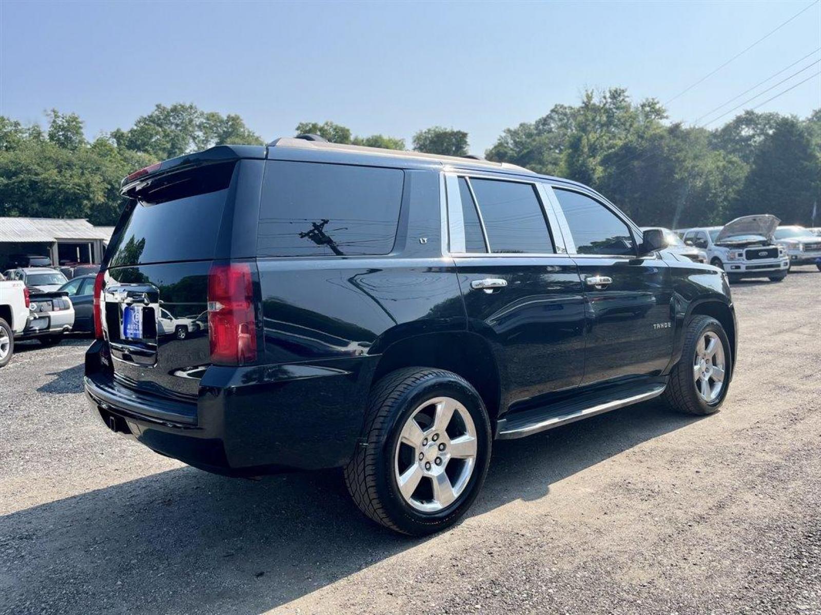 2015 Black /Black Chevrolet Tahoe LT 4WD (1GNSKBKC5FR) with an 5.3l V8 DI VVT Flex 5.3l engine, Automatic transmission, located at 745 East Steele Rd., West Columbia, SC, 29170, (803) 755-9148, 33.927212, -81.148483 - Special Internet Price-2015 Chevrolet Tahoe LT has Leather Interior, Heated Seats, 3rd Row Seating, Back Up Camera, Navigation, Lane Departure Warning and Safety Alert Seat, Forward Collision Alert sensor indicator, Audio system feature, Bose premium 9-speaker system with subwoofer in center console - Photo #3