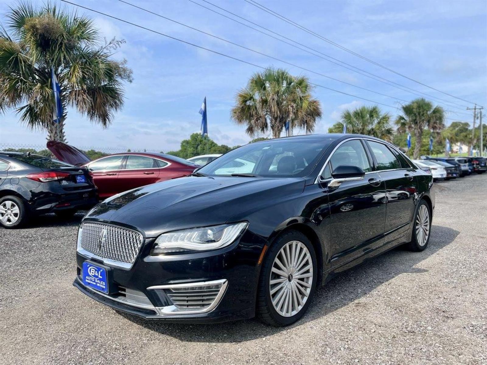 2017 Black /Black Lincoln MKZ Reserve FWD (3LN6L5E91HR) with an 2.0l I-4 DI T/C Ecoboost engine, Automatic transmission, located at 745 East Steele Rd., West Columbia, SC, 29170, (803) 755-9148, 33.927212, -81.148483 - Special Internet Price-2017 Lincoln MKZ has trial subscription to SiriusXM, Leather Interior, Bluetooth, 8 LCD capacitive touchscreen in center stack w/swipe and pinch-to-zoom capability, SYNC AppLink, Back Up Camera and Powered Front Seats, Cruise Control w/Steering Wheel Controls, Day-Night Auto-D - Photo #0