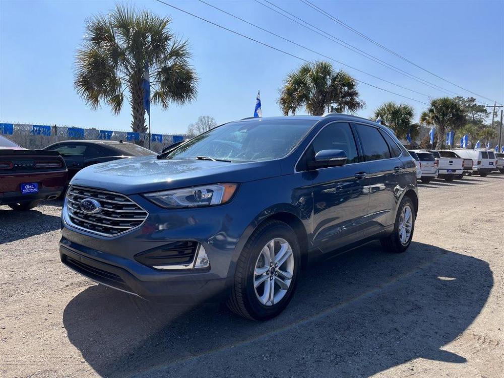 2019 Blue /Tan Ford Edge (2FMPK3J90KB) with an 2.0l I-4 DI Ecoboost 2.0l engine, Automatic transmission, located at 745 East Steele Rd., West Columbia, SC, 29170, (803) 755-9148, 33.927212, -81.148483 - Special Internet Price-2019 Ford Edge has Leather Interior, Bluetooth, Back Up Camera, Power Windows and Seats - Photo #0