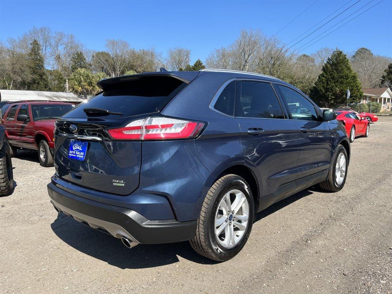 2019 Blue /Tan Ford Edge SEL FWD (2FMPK3J90KB) with an 2.0l I-4 DI Ecoboost 2.0l engine, Automatic transmission, located at 745 East Steele Rd., West Columbia, SC, 29170, (803) 755-9148, 33.927212, -81.148483 - Special Internet Price-2019 Ford Edge has trial subscription to SiriusXM, Leather Interior, Bluetooth, AM/FM Stereo/MP3 Capable -inc: speed-compensated volume and USB media hu, Back Up Camera, Lane-Keeping Assist Lane Keeping Assist, Blind Spot Information System, Automatic Emergency Braking and Cro - Photo #2