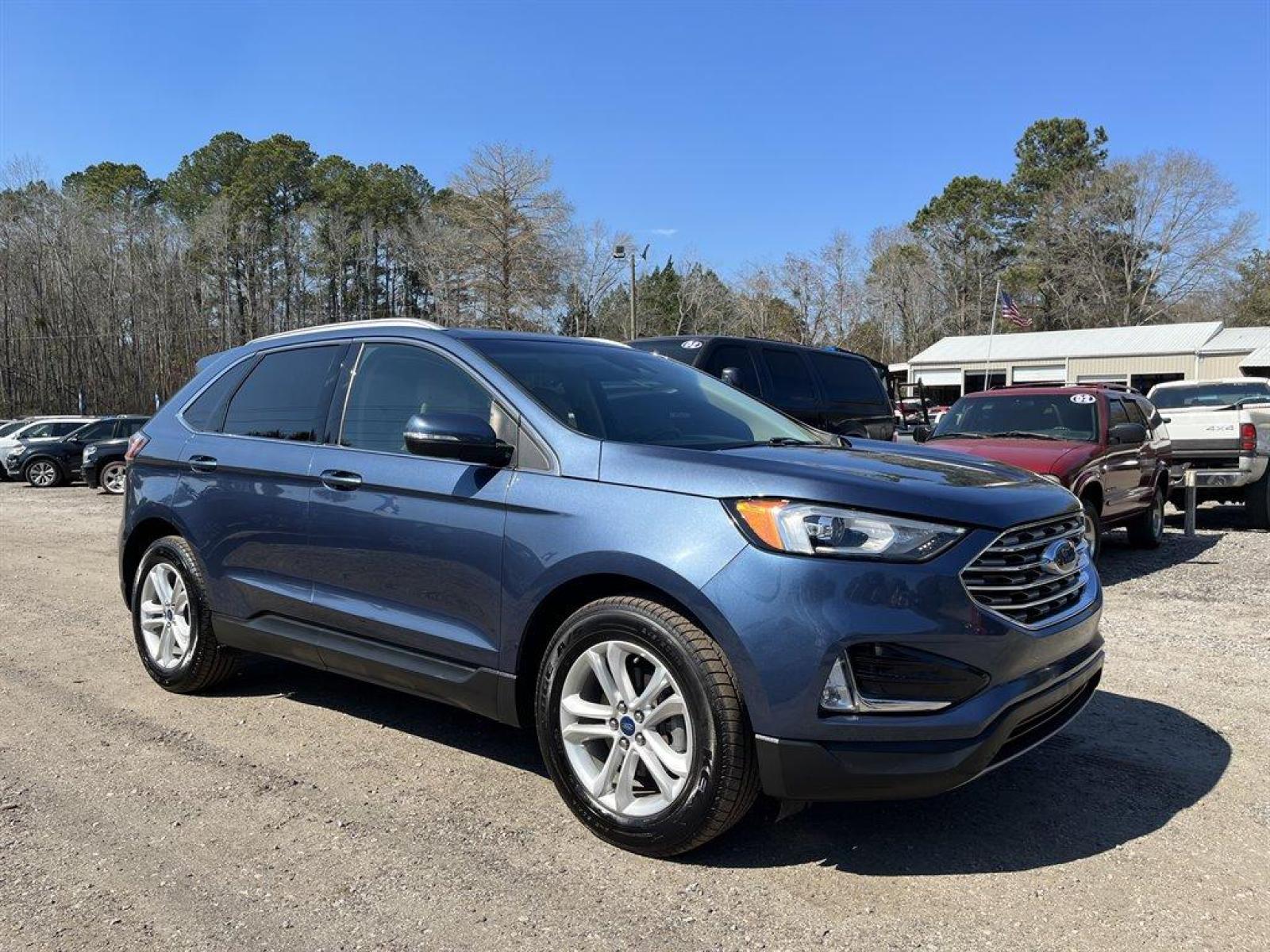2019 Blue /Tan Ford Edge (2FMPK3J90KB) with an 2.0l I-4 DI Ecoboost 2.0l engine, Automatic transmission, located at 745 East Steele Rd., West Columbia, SC, 29170, (803) 755-9148, 33.927212, -81.148483 - Special Internet Price-2019 Ford Edge has Leather Interior, Bluetooth, Back Up Camera, Power Windows and Seats - Photo #3