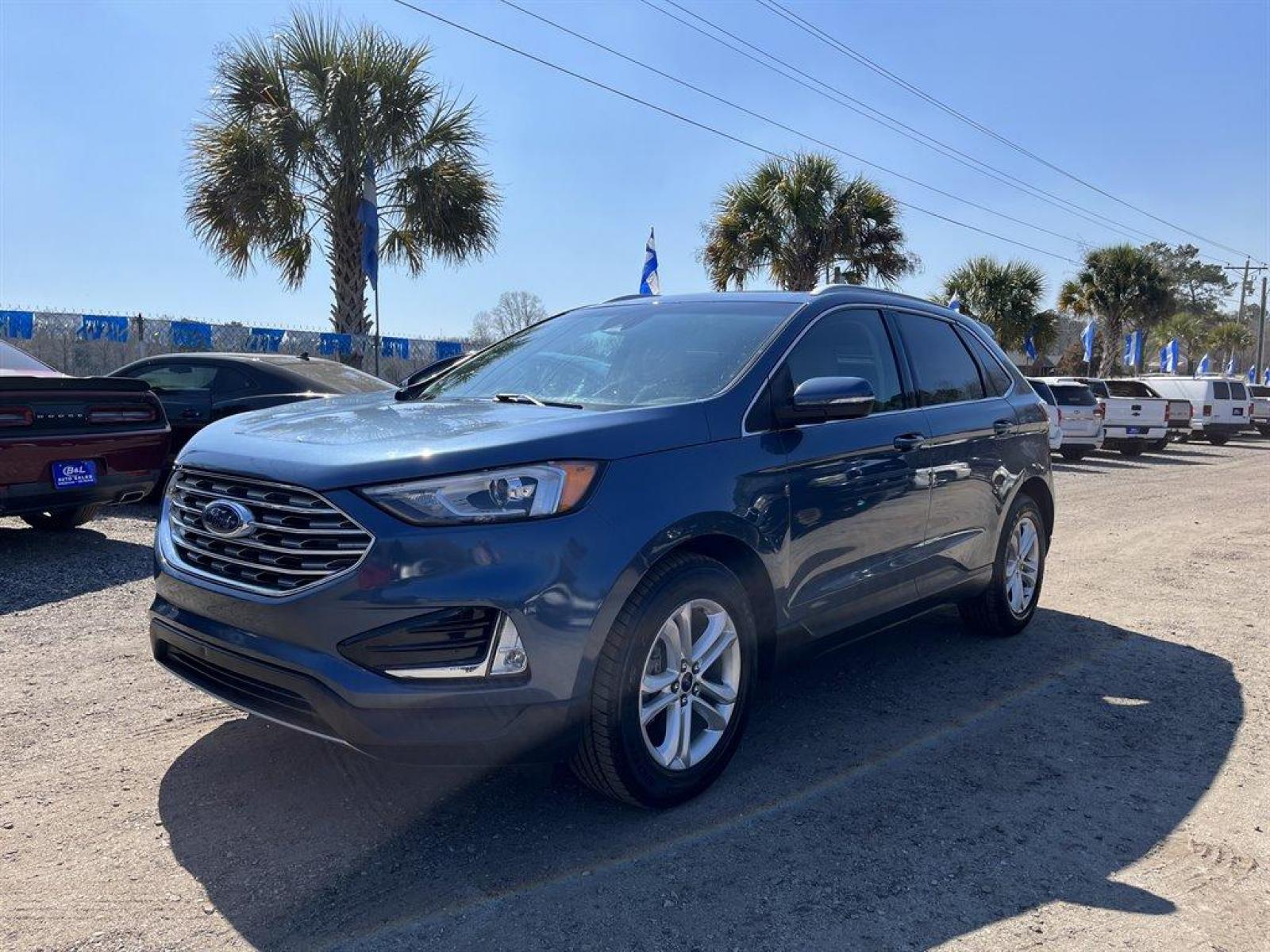 2019 Blue /Tan Ford Edge SEL FWD (2FMPK3J90KB) with an 2.0l I-4 DI Ecoboost 2.0l engine, Automatic transmission, located at 745 East Steele Rd., West Columbia, SC, 29170, (803) 755-9148, 33.927212, -81.148483 - Special Internet Price-2019 Ford Edge has trial subscription to SiriusXM, Leather Interior, Bluetooth, AM/FM Stereo/MP3 Capable -inc: speed-compensated volume and USB media hu, Back Up Camera, Lane-Keeping Assist Lane Keeping Assist, Blind Spot Information System, Automatic Emergency Braking and Cro - Photo #0