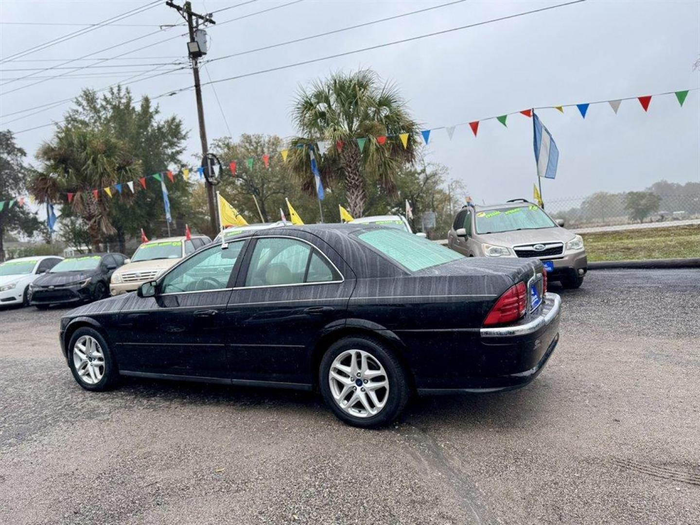 2002 Black /Tan Lincoln LS (1LNHM87A92Y) with an 3.9l V8 EFI Dohc 3.9l engine, Automatic transmission, located at 745 East Steele Rd., West Columbia, SC, 29170, (803) 755-9148, 33.927212, -81.148483 - Special Internet Price! 2002 Lincoln LS - Photo#4