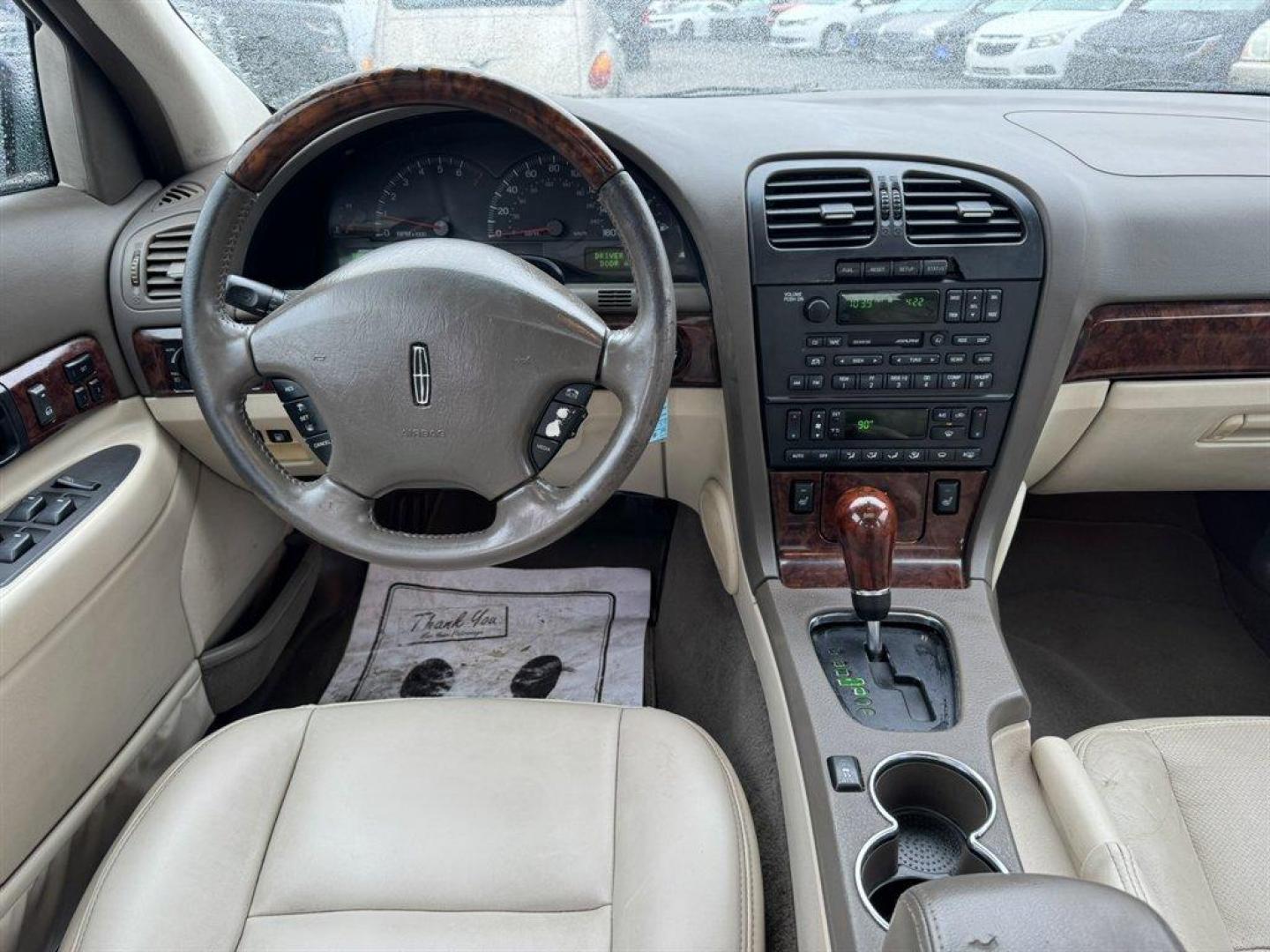 2002 Black /Tan Lincoln LS (1LNHM87A92Y) with an 3.9l V8 EFI Dohc 3.9l engine, Automatic transmission, located at 745 East Steele Rd., West Columbia, SC, 29170, (803) 755-9148, 33.927212, -81.148483 - Special Internet Price! 2002 Lincoln LS - Photo#5