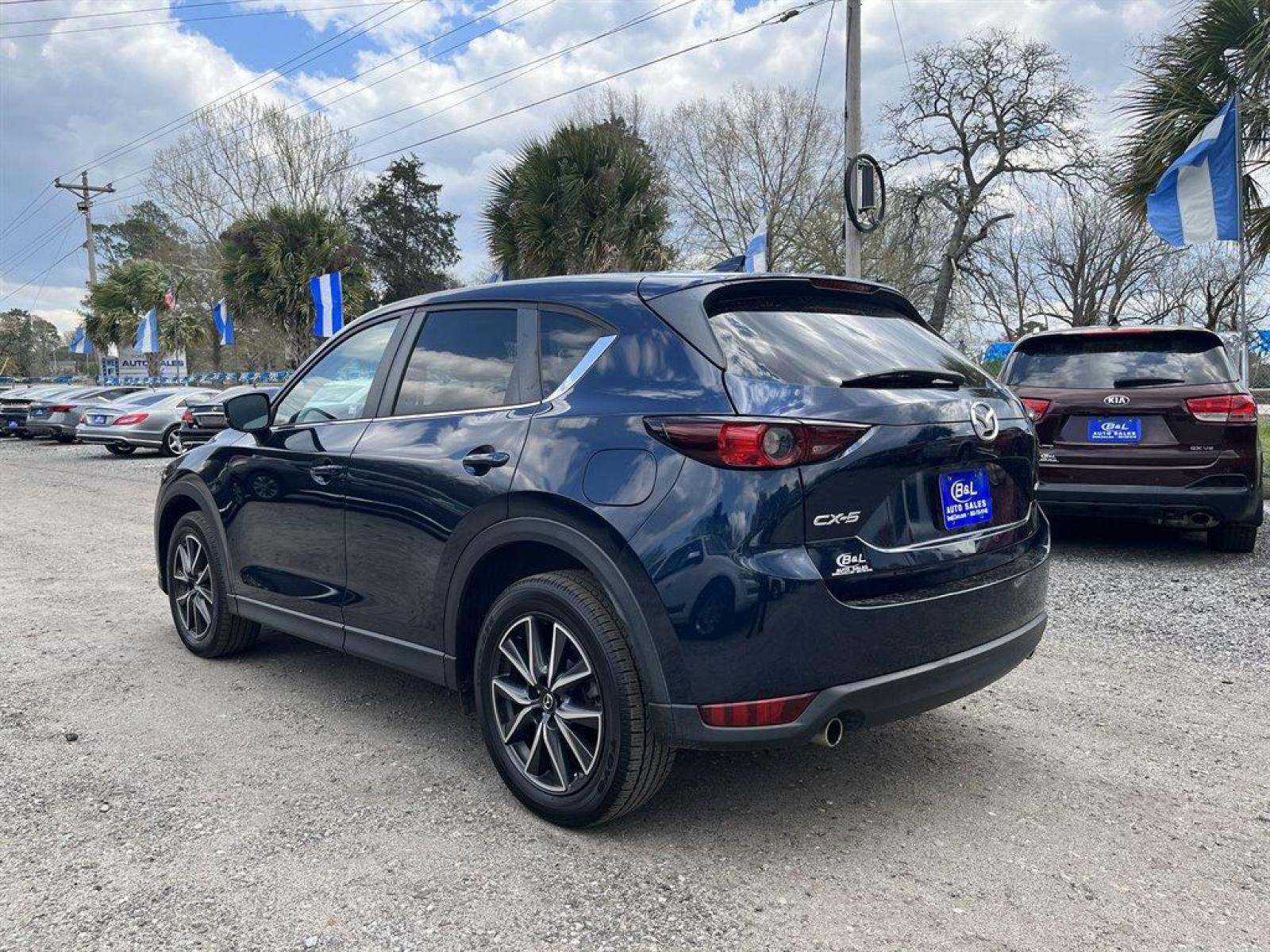 2018 Blue /Tan Mazda CX-5 (JM3KFACM7J0) with an 2.5l I-4 DI Dohc 2.5l engine, Automatic transmission, located at 745 East Steele Rd., West Columbia, SC, 29170, (803) 755-9148, 33.927212, -81.148483 - Special Internet Price! 2018 Mazda CX-5 with sunroof, leather seating, powered front seats, navigation, back up camera, plus more! - Photo #1