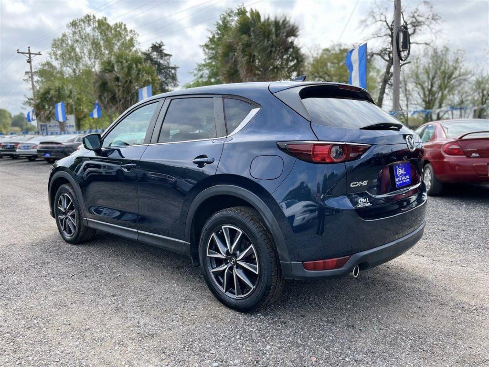 2018 Blue /Tan Mazda CX-5 Touring (JM3KFACM7J0) with an 2.5l I-4 DI Dohc 2.5l engine, Automatic transmission, located at 745 East Steele Rd., West Columbia, SC, 29170, (803) 755-9148, 33.927212, -81.148483 - Special Internet Price! 2018 Mazda CX-5 With Bluetooth, Backup Camera, Navigation, Leather Interior, Sunroof, AM/FM/HD Audio System -inc: 7 full-color touch-screen display, 6-speakers, Remote Keyless Entry,Blind Spot Monitoring, Collision Mitigation-Front, Plus More! - Photo #2
