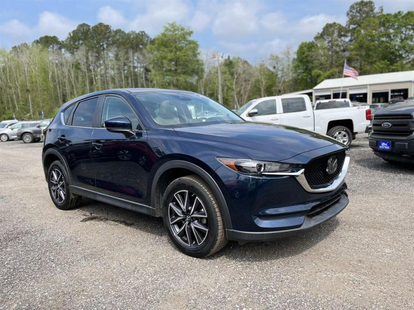 2018 Blue /Tan Mazda CX-5 Touring (JM3KFACM7J0) with an 2.5l I-4 DI Dohc 2.5l engine, Automatic transmission, located at 745 East Steele Rd., West Columbia, SC, 29170, (803) 755-9148, 33.927212, -81.148483 - Special Internet Price! 2018 Mazda CX-5 With Bluetooth, Backup Camera, Navigation, Leather Interior, Sunroof, AM/FM/HD Audio System -inc: 7 full-color touch-screen display, 6-speakers, Remote Keyless Entry,Blind Spot Monitoring, Collision Mitigation-Front, Plus More! - Photo #4