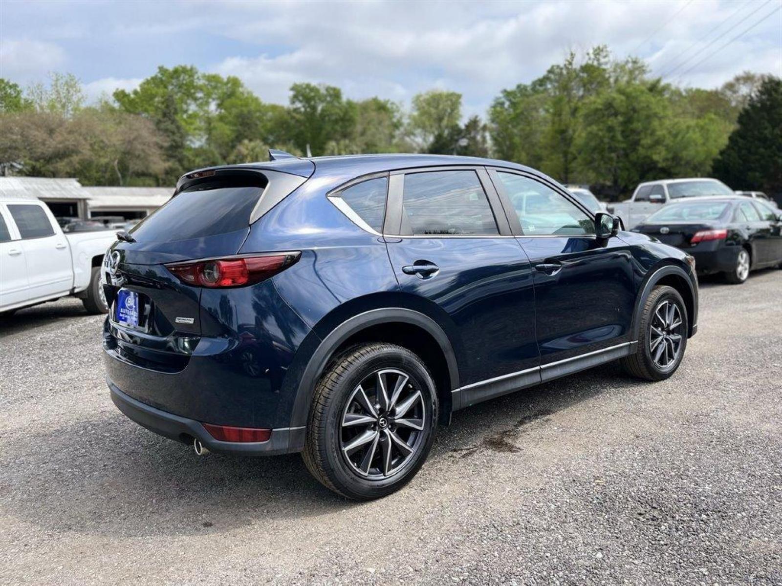 2018 Blue /Tan Mazda CX-5 Touring (JM3KFACM7J0) with an 2.5l I-4 DI Dohc 2.5l engine, Automatic transmission, located at 745 East Steele Rd., West Columbia, SC, 29170, (803) 755-9148, 33.927212, -81.148483 - Special Internet Price! 2018 Mazda CX-5 With Bluetooth, Backup Camera, Navigation, Leather Interior, Sunroof, AM/FM/HD Audio System -inc: 7 full-color touch-screen display, 6-speakers, Remote Keyless Entry,Blind Spot Monitoring, Collision Mitigation-Front, Plus More! - Photo #3