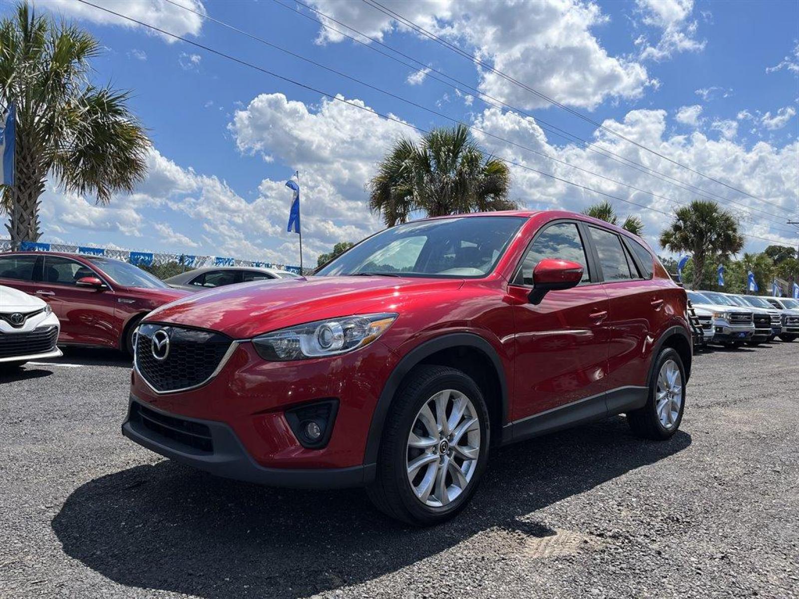2015 Red /Black Mazda CX-5 (JM3KE4DY7F0) with an 2.5l I-4 DI Dohc 2.5l engine, Automatic transmission, located at 745 East Steele Rd., West Columbia, SC, 29170, (803) 755-9148, 33.927212, -81.148483 - Special Internet Price 2015 Mazda CX-5 has Sunroof, Bluetooth and Back Up Camera - Photo #0