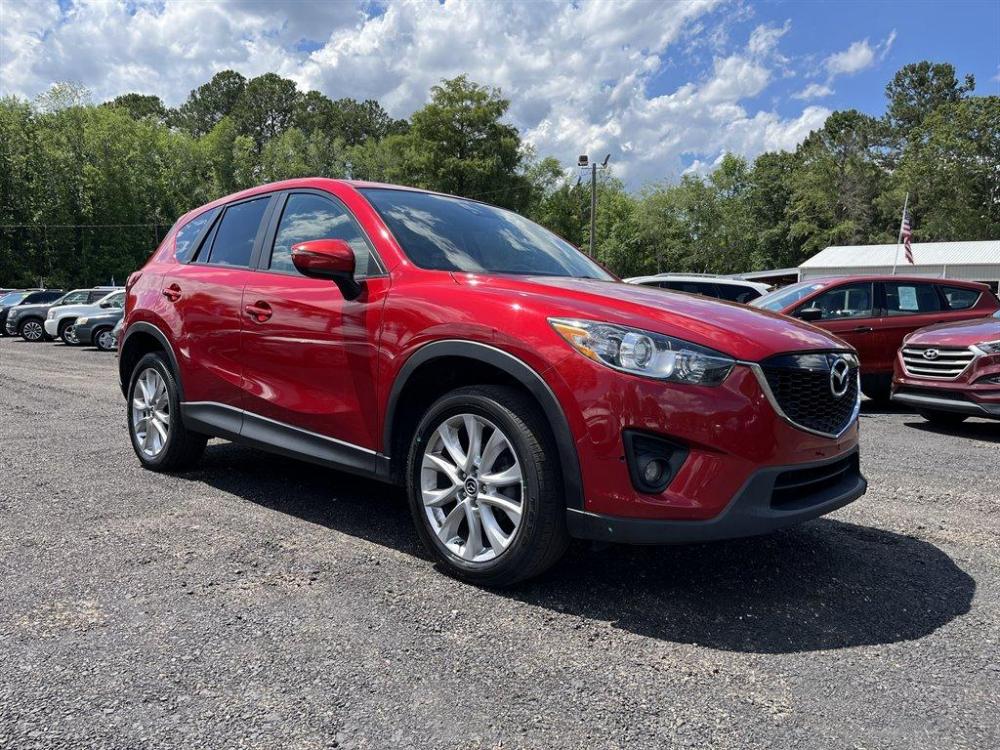 2015 Red /Black Mazda CX-5 (JM3KE4DY7F0) with an 2.5l I-4 DI Dohc 2.5l engine, Automatic transmission, located at 745 East Steele Rd., West Columbia, SC, 29170, (803) 755-9148, 33.927212, -81.148483 - Special Internet Price 2015 Mazda CX-5 has Sunroof, Bluetooth and Back Up Camera - Photo #3