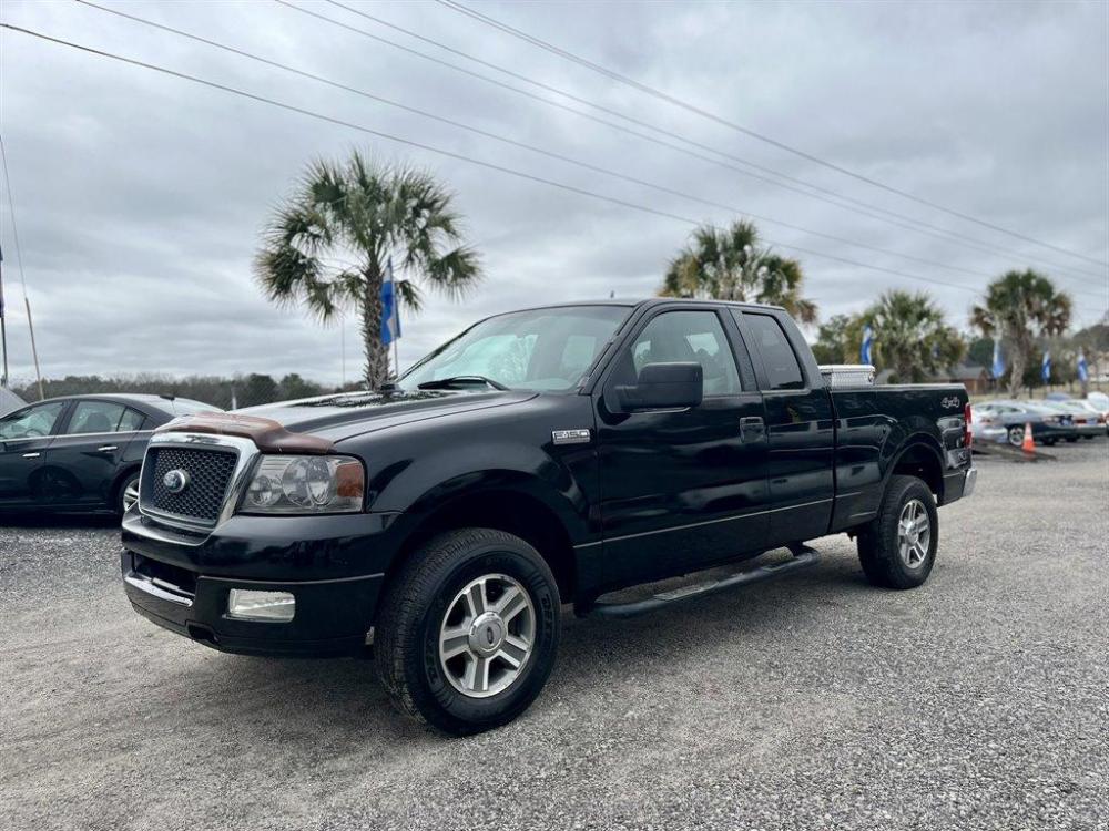 2007 Black /Grey Ford F150 (1FTRX14W47N) with an 4.6l V8 EFI Sohc 4.6l engine, Automatic transmission, located at 745 East Steele Rd., West Columbia, SC, 29170, (803) 755-9148, 33.927212, -81.148483 - Special Internet Price-2007 Ford F-150 has Power Windows, Cloth Interior and 4 Door - Photo #0