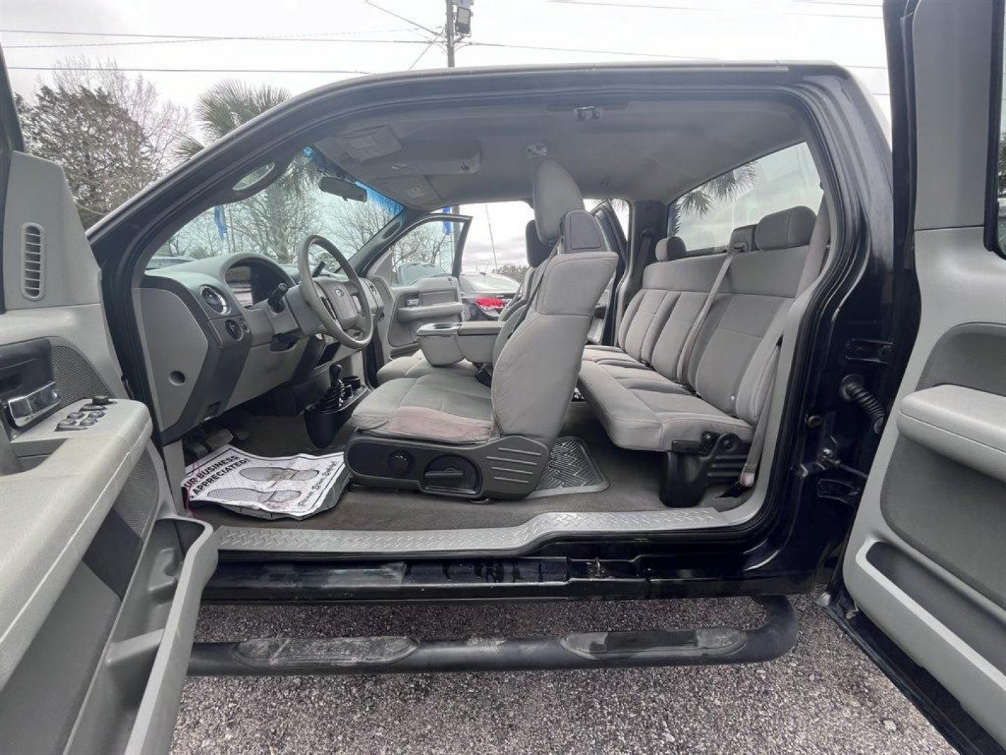 2007 Black /Grey Ford F150 (1FTRX14W47N) with an 4.6l V8 EFI Sohc 4.6l engine, Automatic transmission, located at 745 East Steele Rd., West Columbia, SC, 29170, (803) 755-9148, 33.927212, -81.148483 - Special Internet Price! 2007 Ford F-150 XLT with AM/FM stereo w/CD player, Cruise control, Remote keyless entry, Premium cloth 40/20/40 split bench front seat, Powered windows, Powered door locks, Plus more! - Photo#17