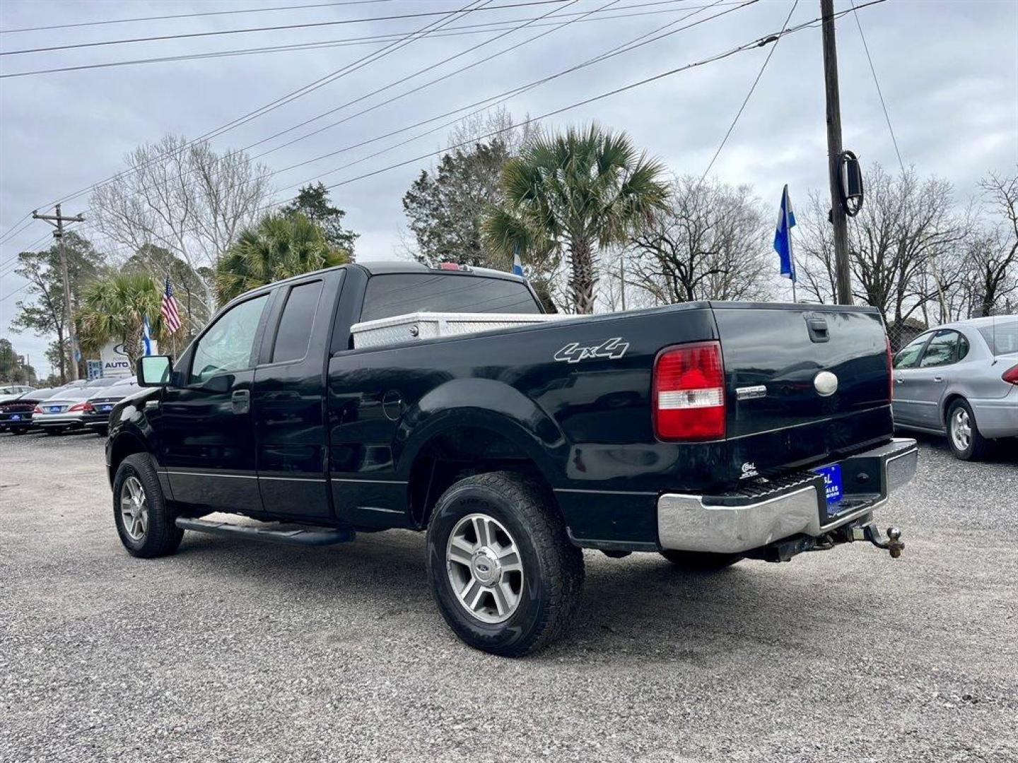 2007 Black /Grey Ford F150 (1FTRX14W47N) with an 4.6l V8 EFI Sohc 4.6l engine, Automatic transmission, located at 745 East Steele Rd., West Columbia, SC, 29170, (803) 755-9148, 33.927212, -81.148483 - Special Internet Price! 2007 Ford F-150 XLT with AM/FM stereo w/CD player, Cruise control, Remote keyless entry, Premium cloth 40/20/40 split bench front seat, Powered windows, Powered door locks, Plus more! - Photo#1