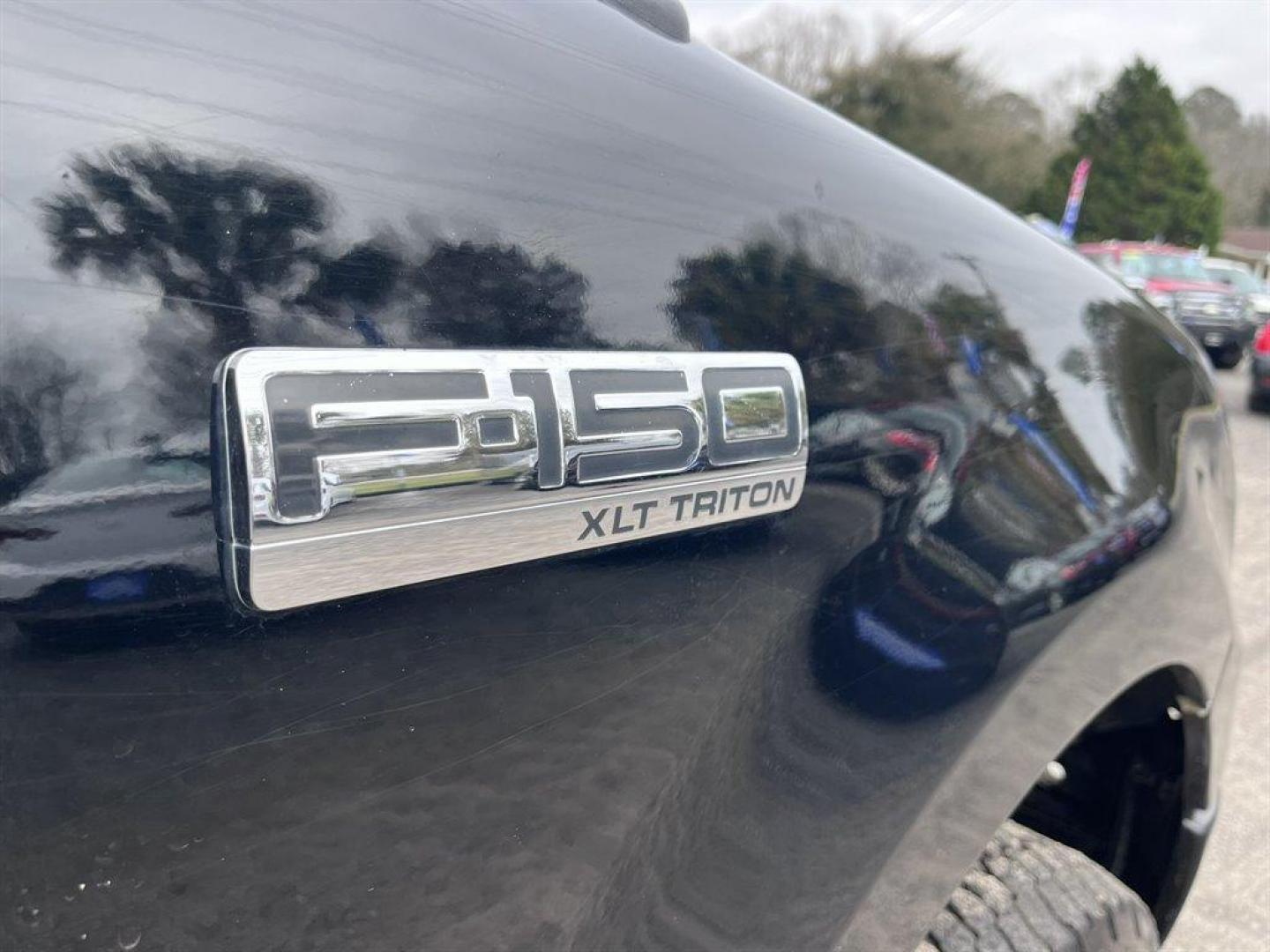 2007 Black /Grey Ford F150 (1FTRX14W47N) with an 4.6l V8 EFI Sohc 4.6l engine, Automatic transmission, located at 745 East Steele Rd., West Columbia, SC, 29170, (803) 755-9148, 33.927212, -81.148483 - Special Internet Price! 2007 Ford F-150 XLT with AM/FM stereo w/CD player, Cruise control, Remote keyless entry, Premium cloth 40/20/40 split bench front seat, Powered windows, Powered door locks, Plus more! - Photo#26