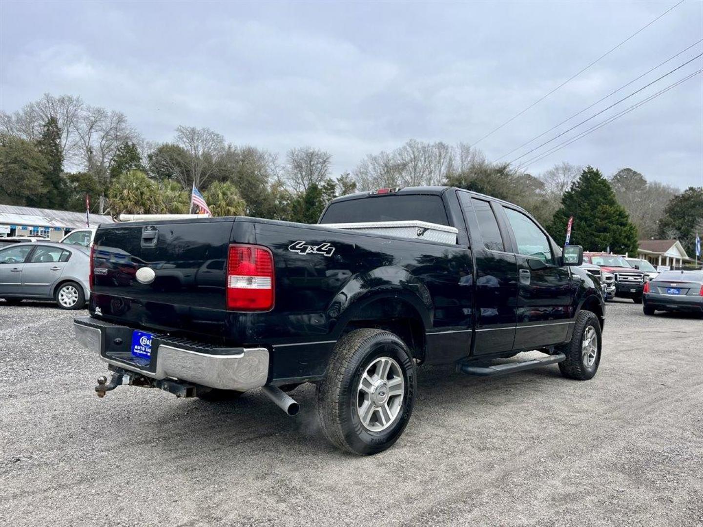 2007 Black /Grey Ford F150 (1FTRX14W47N) with an 4.6l V8 EFI Sohc 4.6l engine, Automatic transmission, located at 745 East Steele Rd., West Columbia, SC, 29170, (803) 755-9148, 33.927212, -81.148483 - Special Internet Price! 2007 Ford F-150 XLT with AM/FM stereo w/CD player, Cruise control, Remote keyless entry, Premium cloth 40/20/40 split bench front seat, Powered windows, Powered door locks, Plus more! - Photo#2