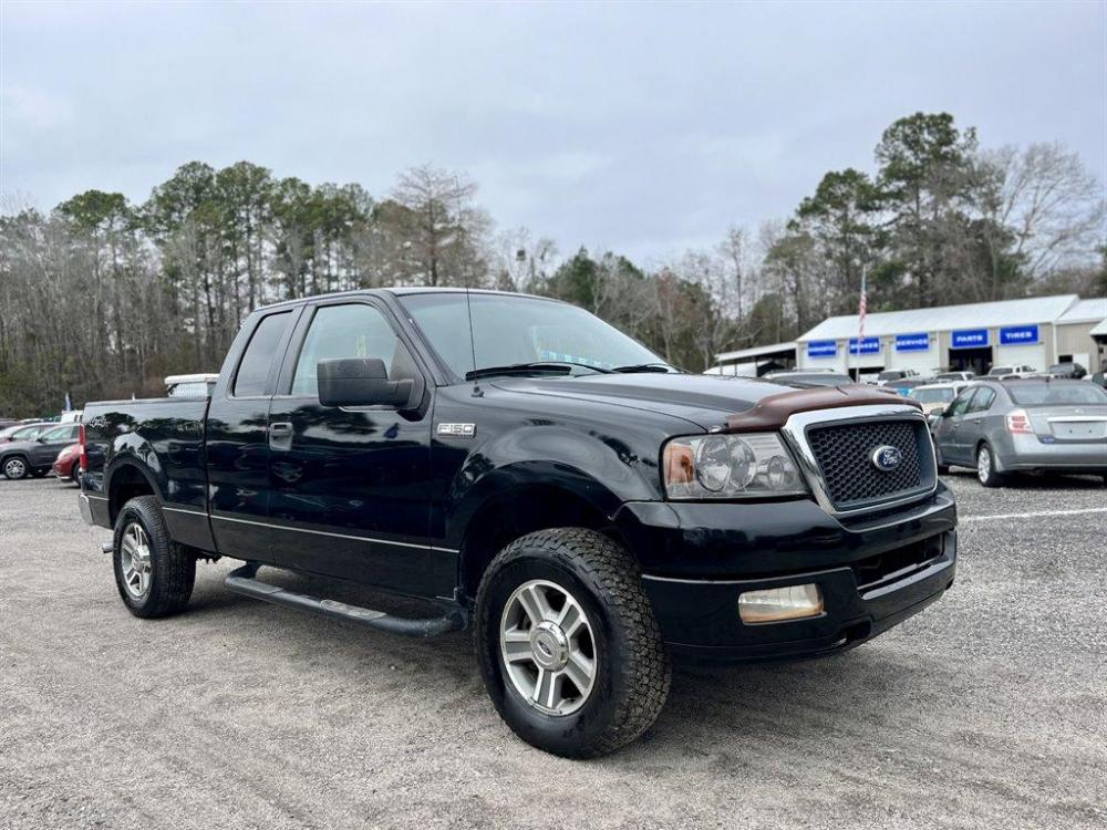 2007 Black /Grey Ford F150 (1FTRX14W47N) with an 4.6l V8 EFI Sohc 4.6l engine, Automatic transmission, located at 745 East Steele Rd., West Columbia, SC, 29170, (803) 755-9148, 33.927212, -81.148483 - Special Internet Price-2007 Ford F-150 has Power Windows, Cloth Interior and 4 Door - Photo #3