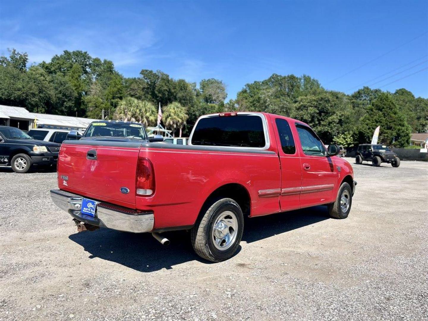 1998 Red /Grey Ford F150 (1FTZX1767WN) with an 4.6l V8 EFI Sohc 4.6l engine, Automatic transmission, located at 745 East Steele Rd., West Columbia, SC, 29170, (803) 755-9148, 33.927212, -81.148483 - Special Internet Price! 1998 Ford F150 Standard with AM/FM radio, Cruise control, Cloth interior, Rear bench seat, Powered windows, Powered door locks, Plus more! - Photo#2