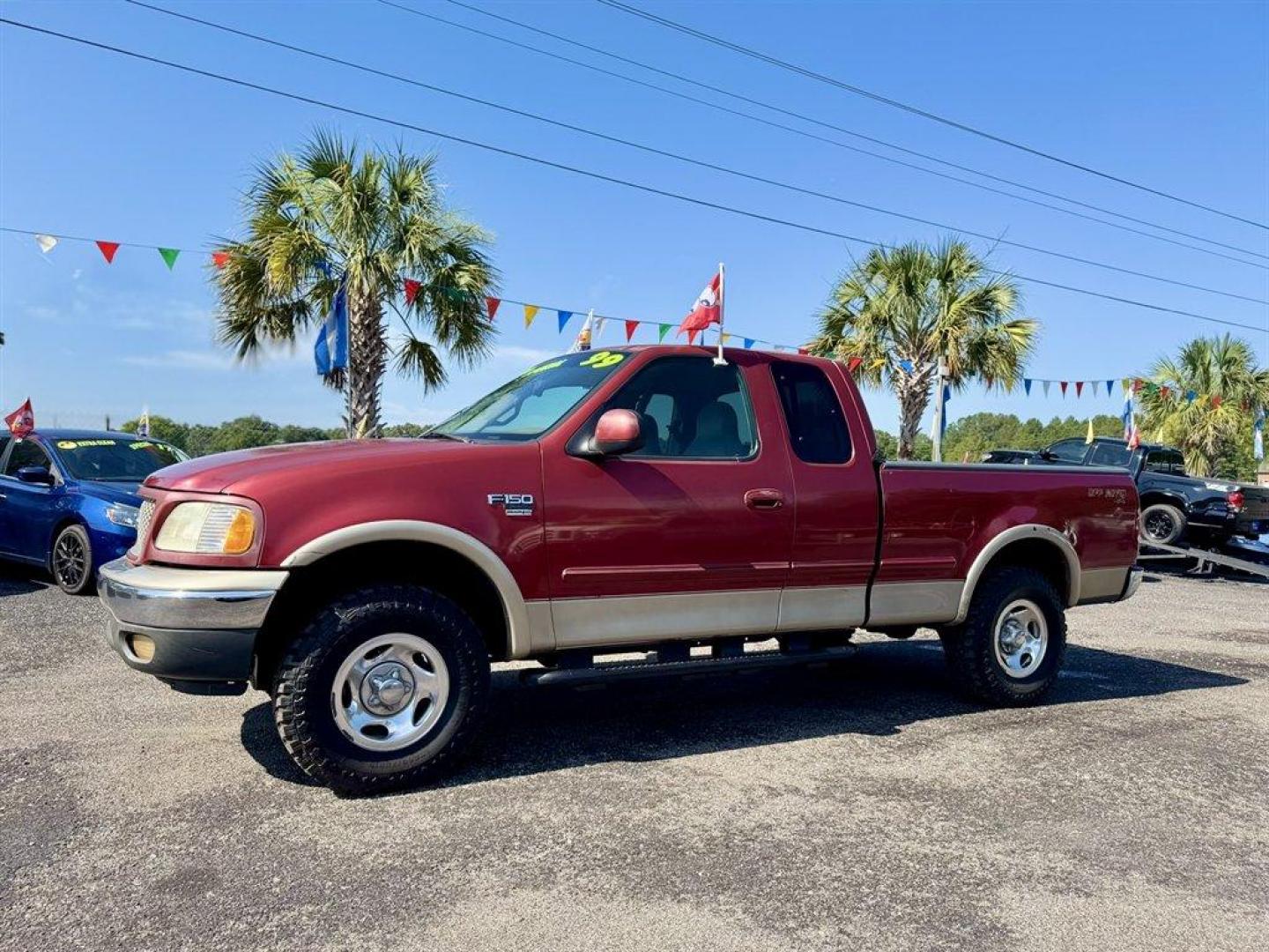 1999 Red /Tan Ford F150 (1FTRX18W0XN) with an 4.6l V8 EFI Sohc 4.6l engine, Automatic transmission, located at 745 East Steele Rd., West Columbia, SC, 29170, (803) 755-9148, 33.927212, -81.148483 - Special Internet Price! 1999 Ford F150 - Photo#0