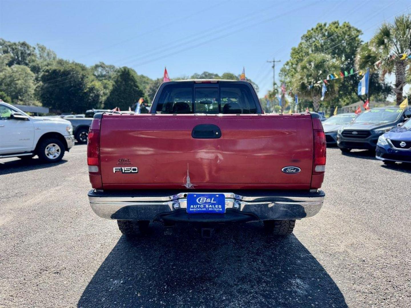 1999 Red /Tan Ford F150 (1FTRX18W0XN) with an 4.6l V8 EFI Sohc 4.6l engine, Automatic transmission, located at 745 East Steele Rd., West Columbia, SC, 29170, (803) 755-9148, 33.927212, -81.148483 - Special Internet Price! 1999 Ford F150 - Photo#4