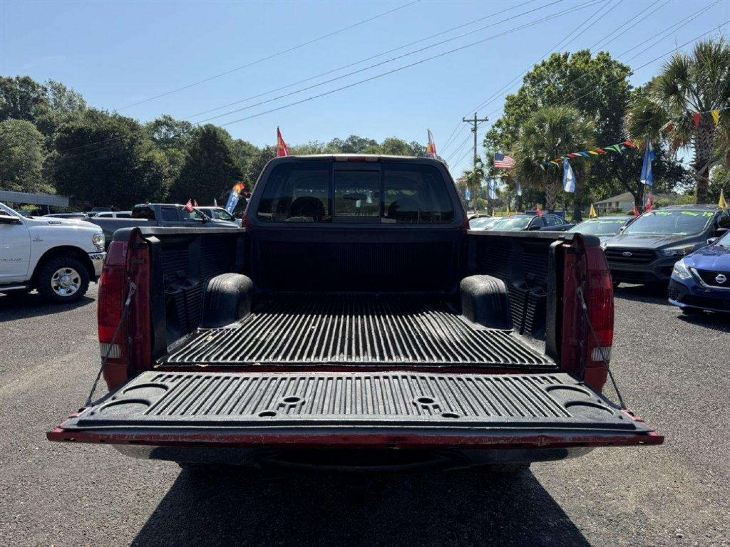 1999 Red /Tan Ford F150 (1FTRX18W0XN) with an 4.6l V8 EFI Sohc 4.6l engine, Automatic transmission, located at 745 East Steele Rd., West Columbia, SC, 29170, (803) 755-9148, 33.927212, -81.148483 - Special Internet Price! 1999 Ford F150 - Photo#27