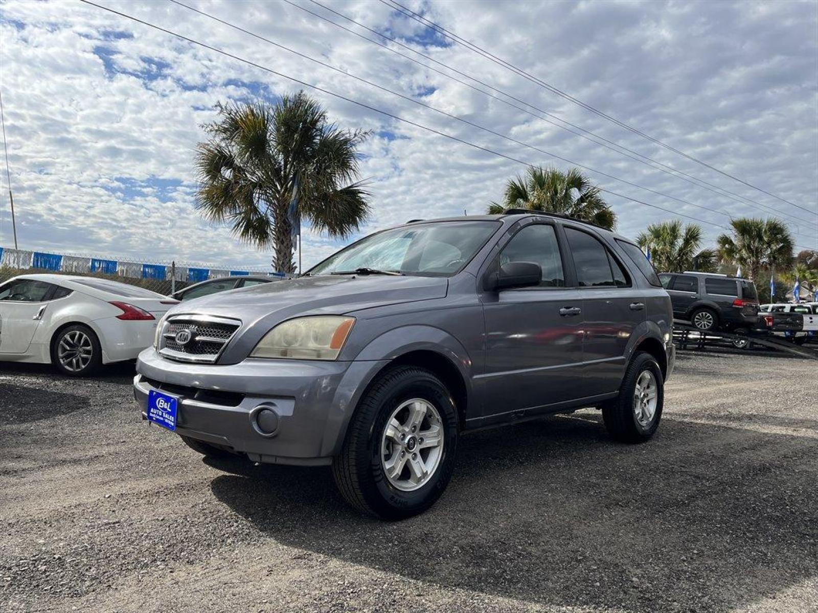 2005 Blue /Grey Kia Sorento (KNDJD733555) with an 3.5l V6 EFI 3.5l engine, Auto transmission, located at 745 East Steele Rd., West Columbia, SC, 29170, (803) 755-9148, 33.927212, -81.148483 - Internet CASH Special Price-2005 Kia Sorento LX has Snow Mode, Power Windows, Cloth Interior and is Very Spacious AS IS! AS IS! AS IS! - Photo #0