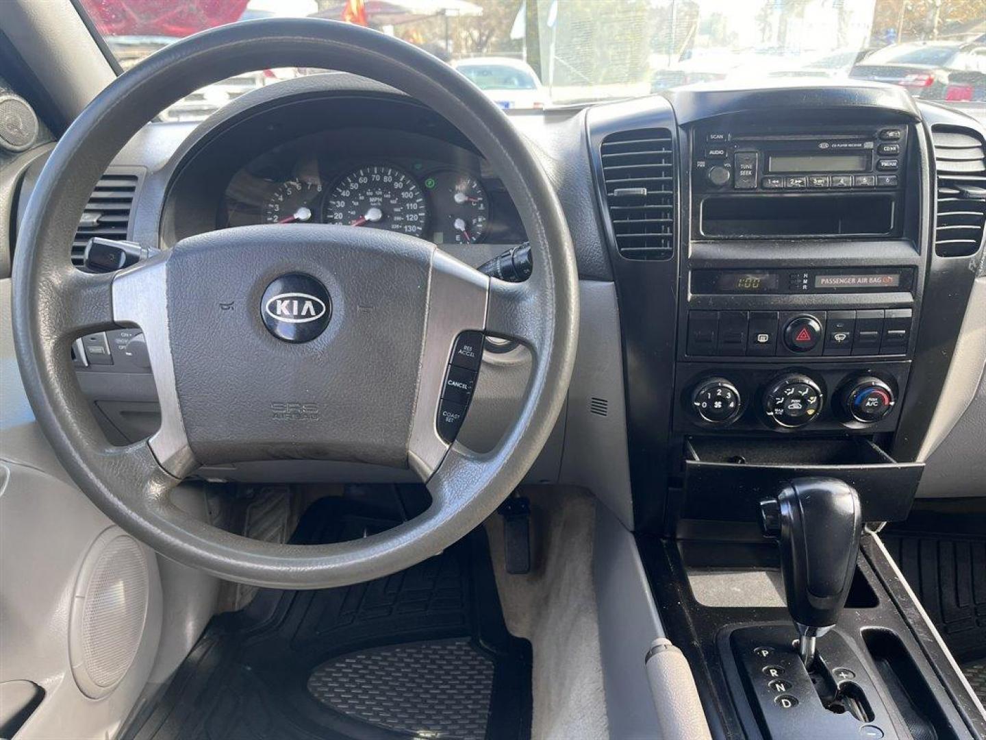 2005 Blue /Grey Kia Sorento EX 2WD (KNDJD733555) with an 3.5l V6 EFI 3.5l engine, Automatic transmission, located at 745 East Steele Rd., West Columbia, SC, 29170, (803) 755-9148, 33.927212, -81.148483 - Special Internet Price! 2005 Kia Sorento with AM/FM radio, Cruise control, Cloth interior, Powered windows, Powered door locks, Plus more! - Photo#4