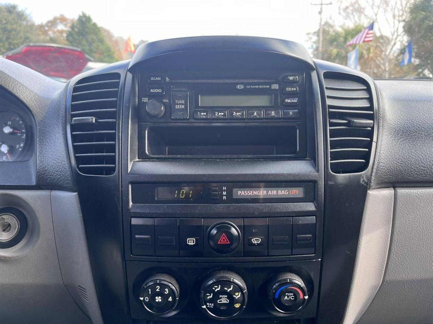 2005 Blue /Grey Kia Sorento EX 2WD (KNDJD733555) with an 3.5l V6 EFI 3.5l engine, Automatic transmission, located at 745 East Steele Rd., West Columbia, SC, 29170, (803) 755-9148, 33.927212, -81.148483 - Special Internet Price! 2005 Kia Sorento with AM/FM radio, Cruise control, Cloth interior, Powered windows, Powered door locks, Plus more! - Photo#9