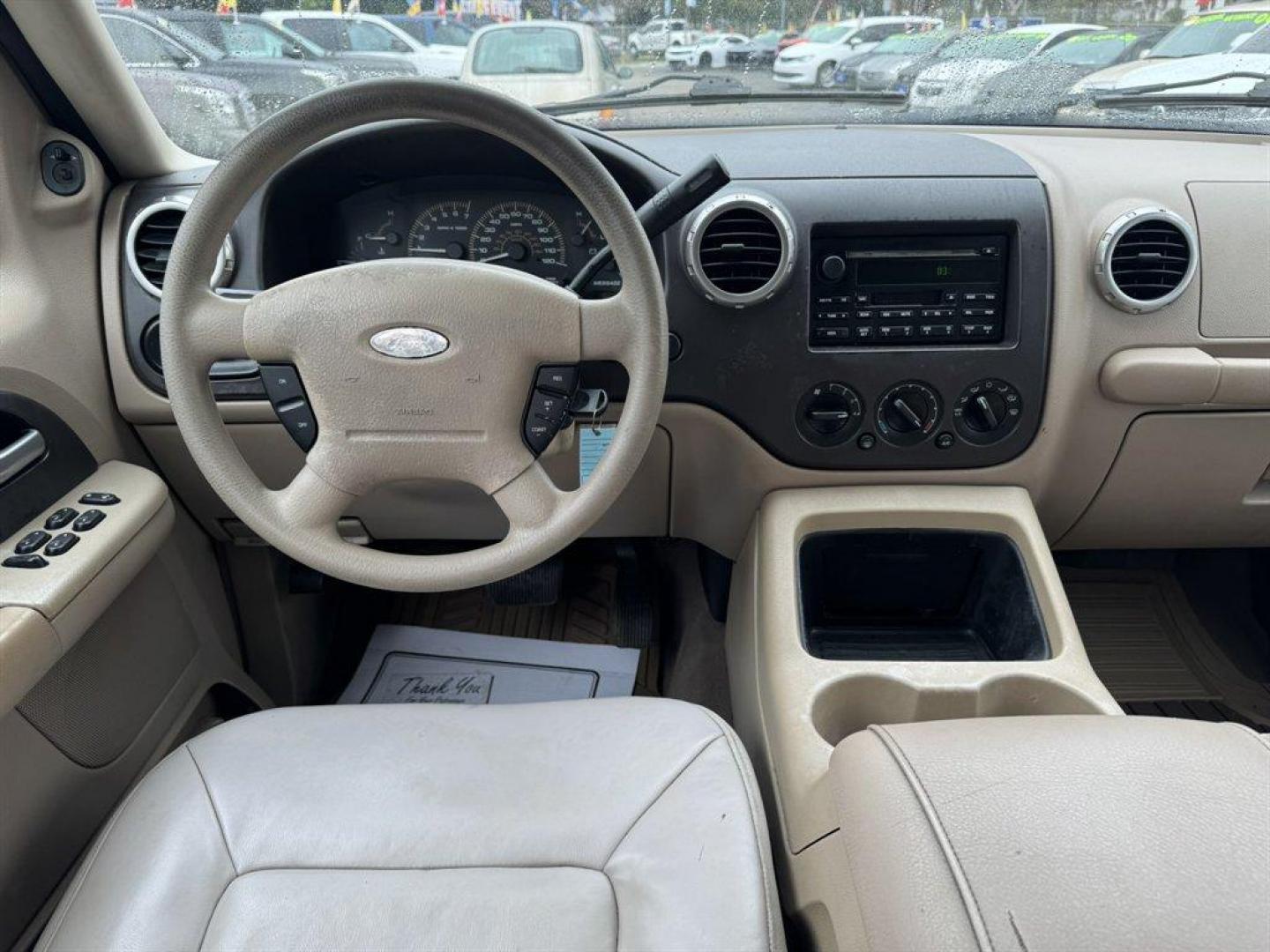 2003 Black /Tan Ford Expedition (1FMEU15W43L) with an 4.6l V8 EFI Sohc 4.6l engine, Automatic transmission, located at 745 East Steele Rd., West Columbia, SC, 29170, (803) 755-9148, 33.927212, -81.148483 - Special Internet Price! 2003 Ford Expedition XLT - Photo#6