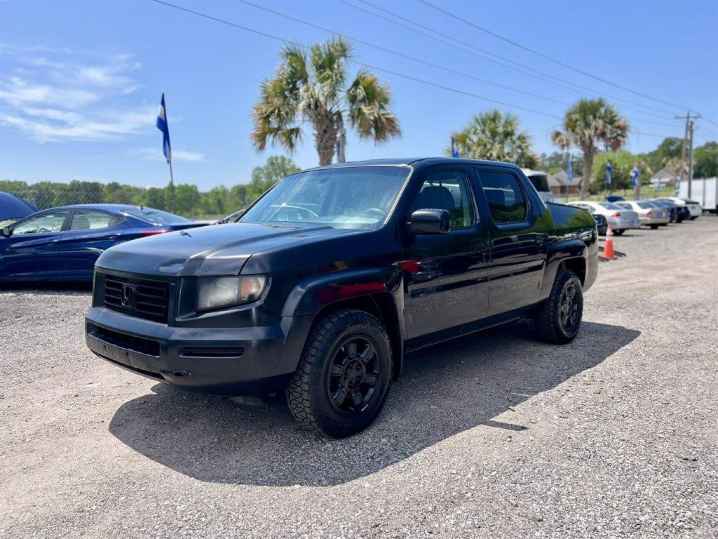 2007 Black /Grey Honda Ridgeline (2HJYK16567H) with an 3.5l V6 MPI Sohc Vtec 3.5 engine, Automatic transmission, located at 745 East Steele Rd., West Columbia, SC, 29170, (803) 755-9148, 33.927212, -81.148483 - Special Internet Price! 2007 Honda Ridgeline RTL with AM/FM radio, Remote keyless entry, Cruise control, Dual-zone automatic climate control, Leather interior, 60/40 split fold rear seat, Powered windows, Powered door locks, Plus more! - Photo#0